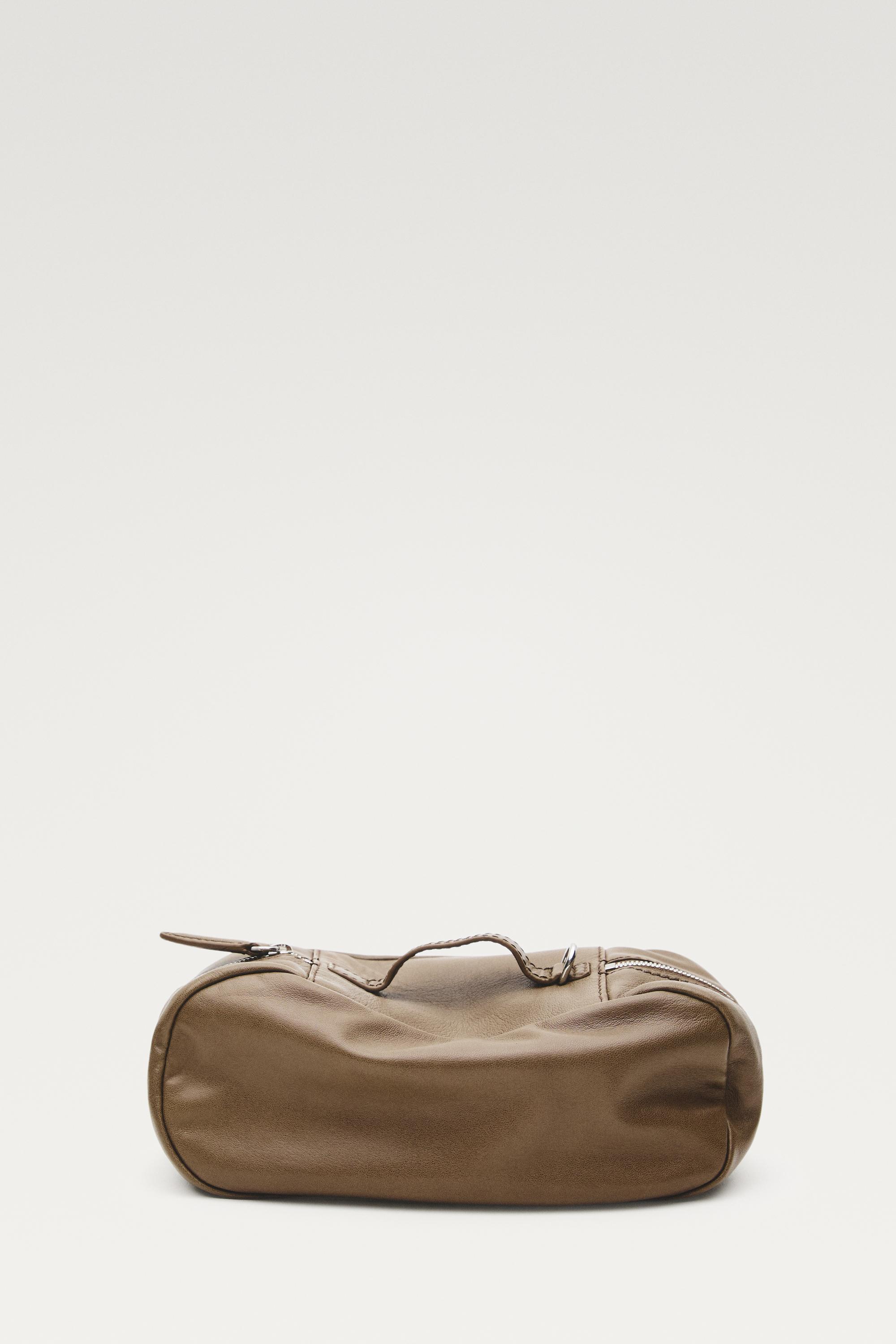 Oval nappa leather toiletry bag — MOLE BROWN