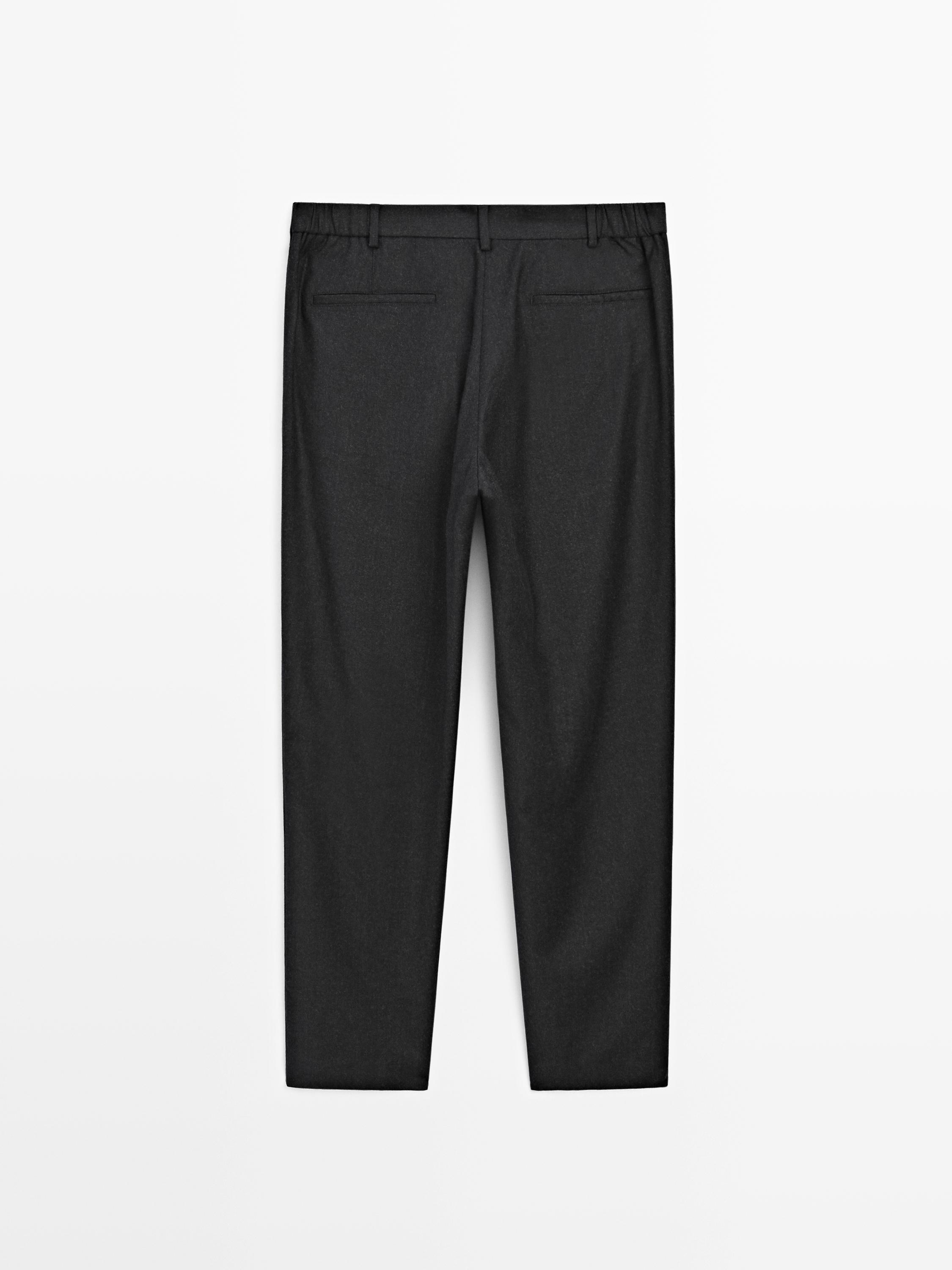 100% wool flannel trousers with elasticated side