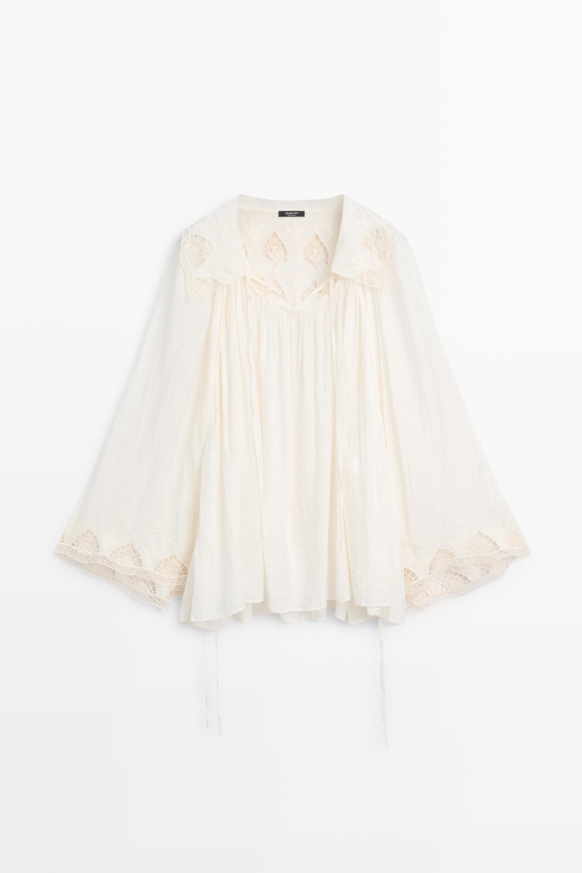 Blusa fluida detalle bordados