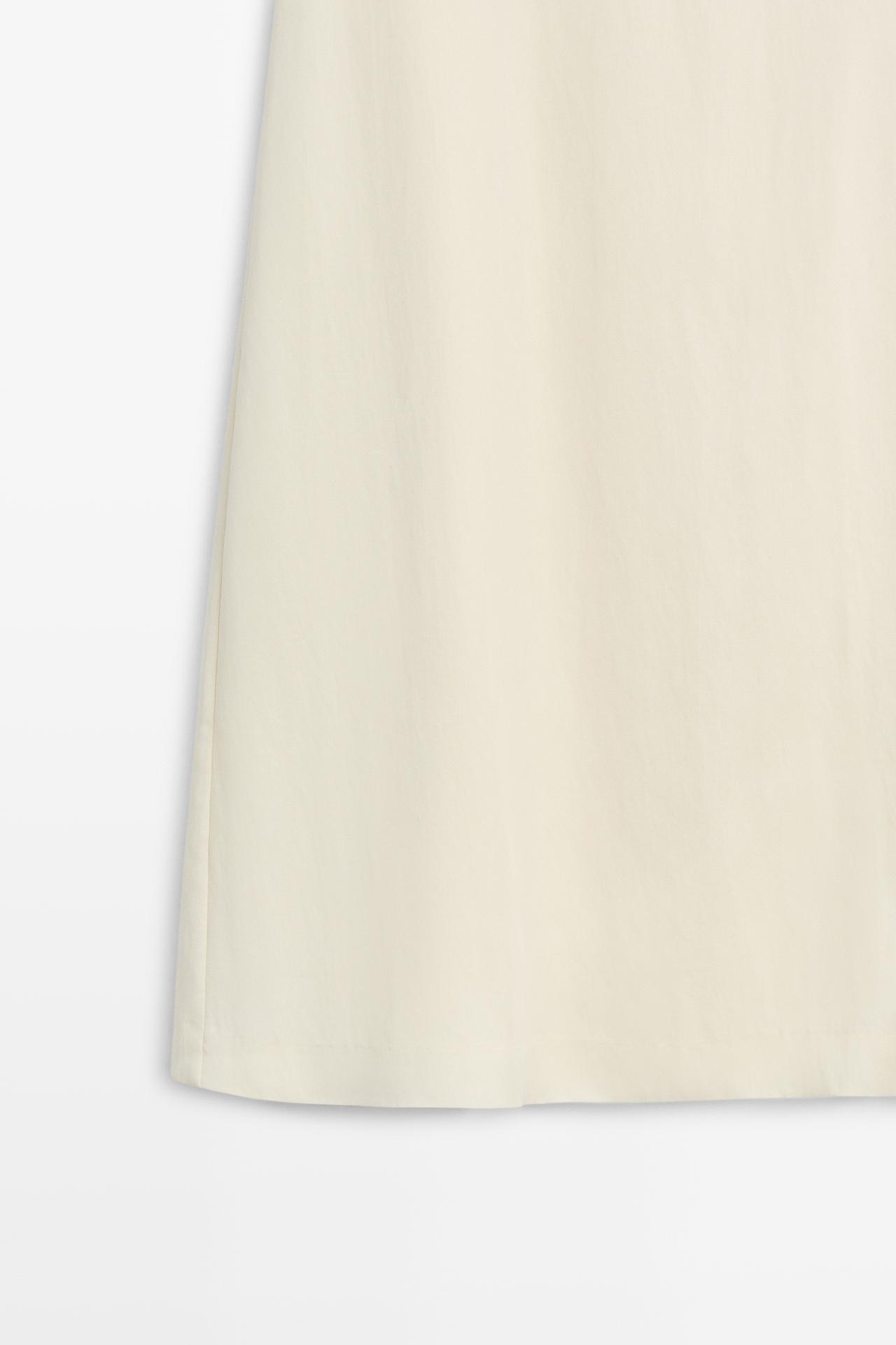 Straight midi skirt with button detail — CREAM