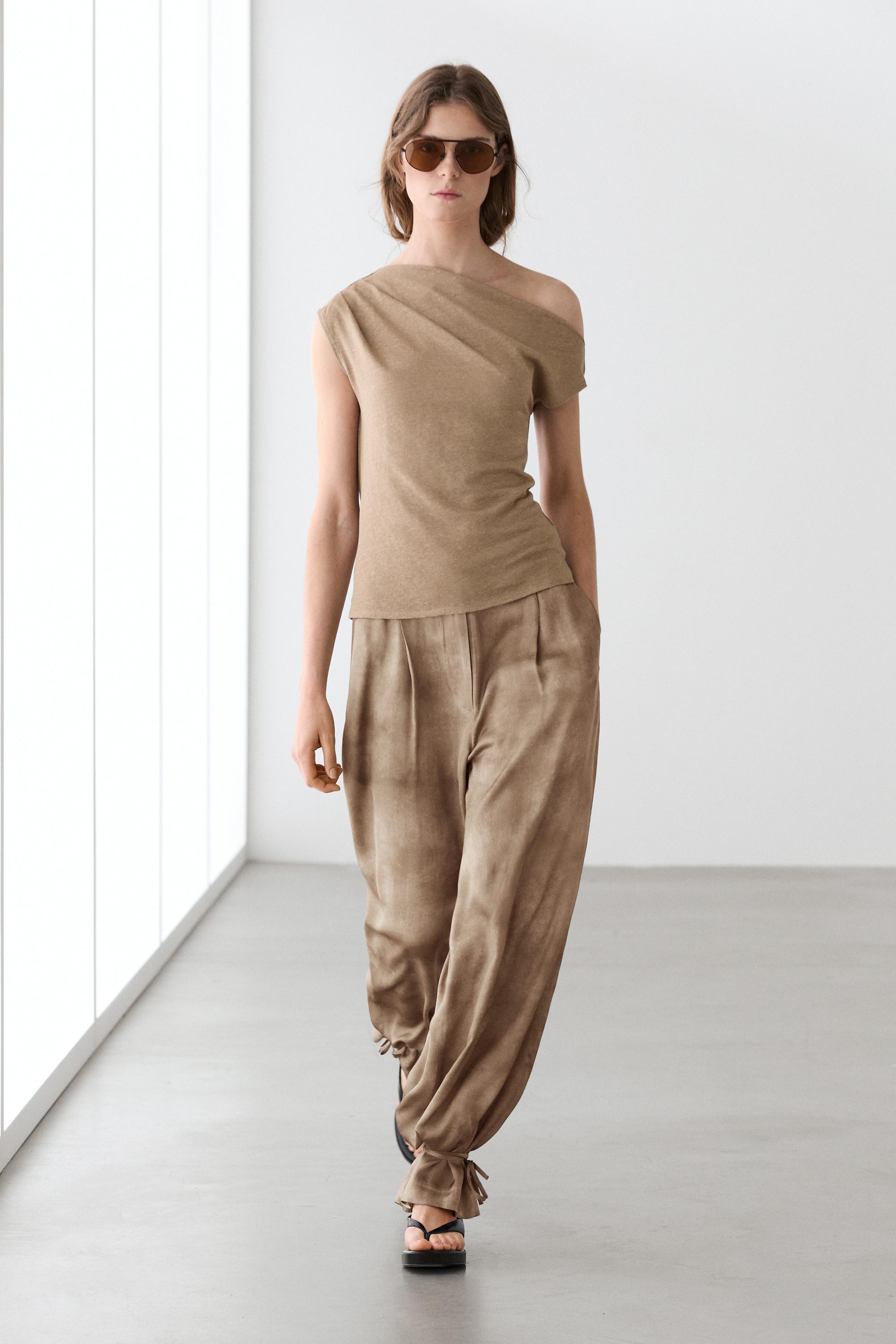 Flowing pants with tie-detail hem — BEIGE
