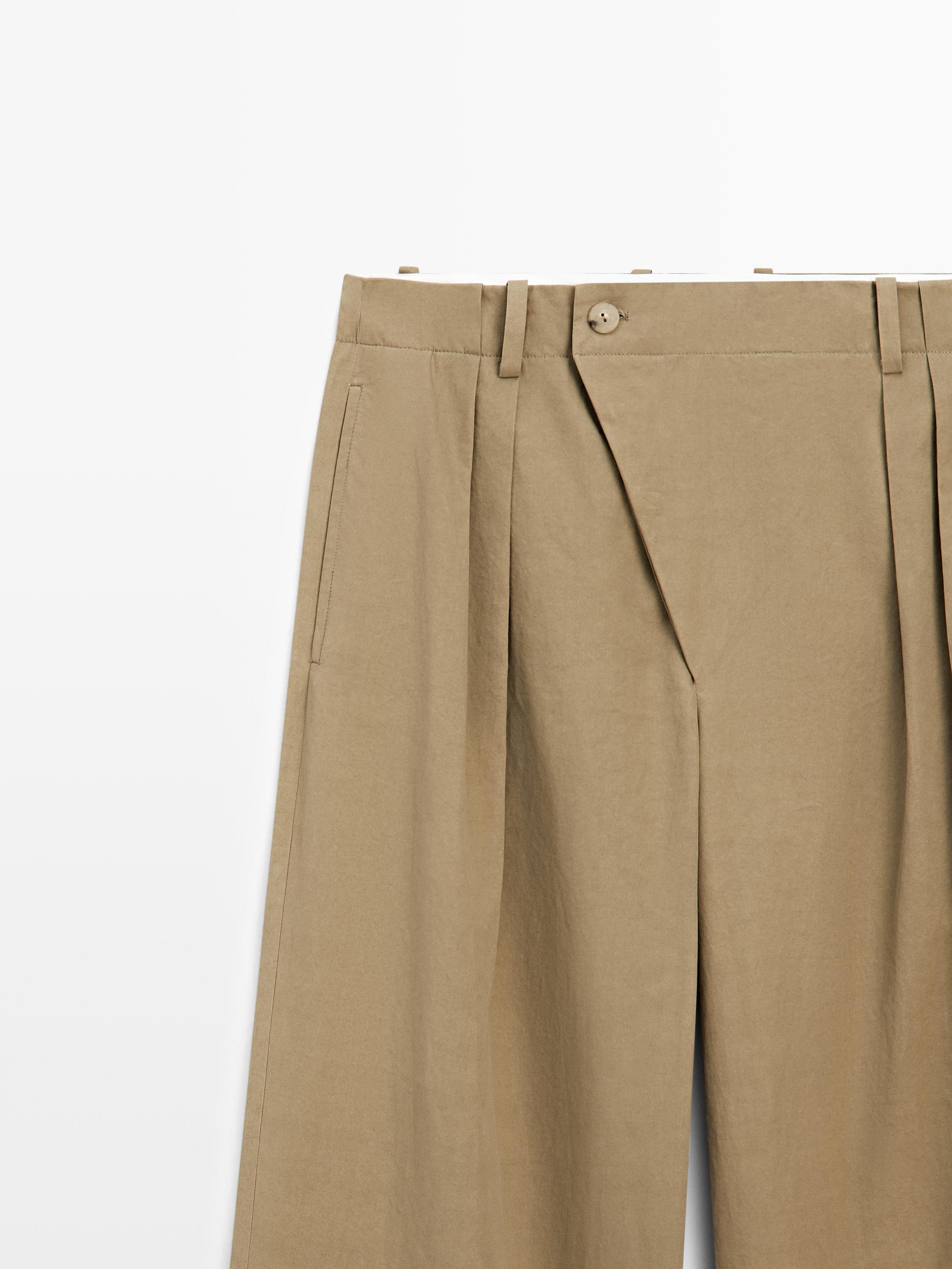 Pleated pants with crossover fastening detail - STUDIO — KHAKI