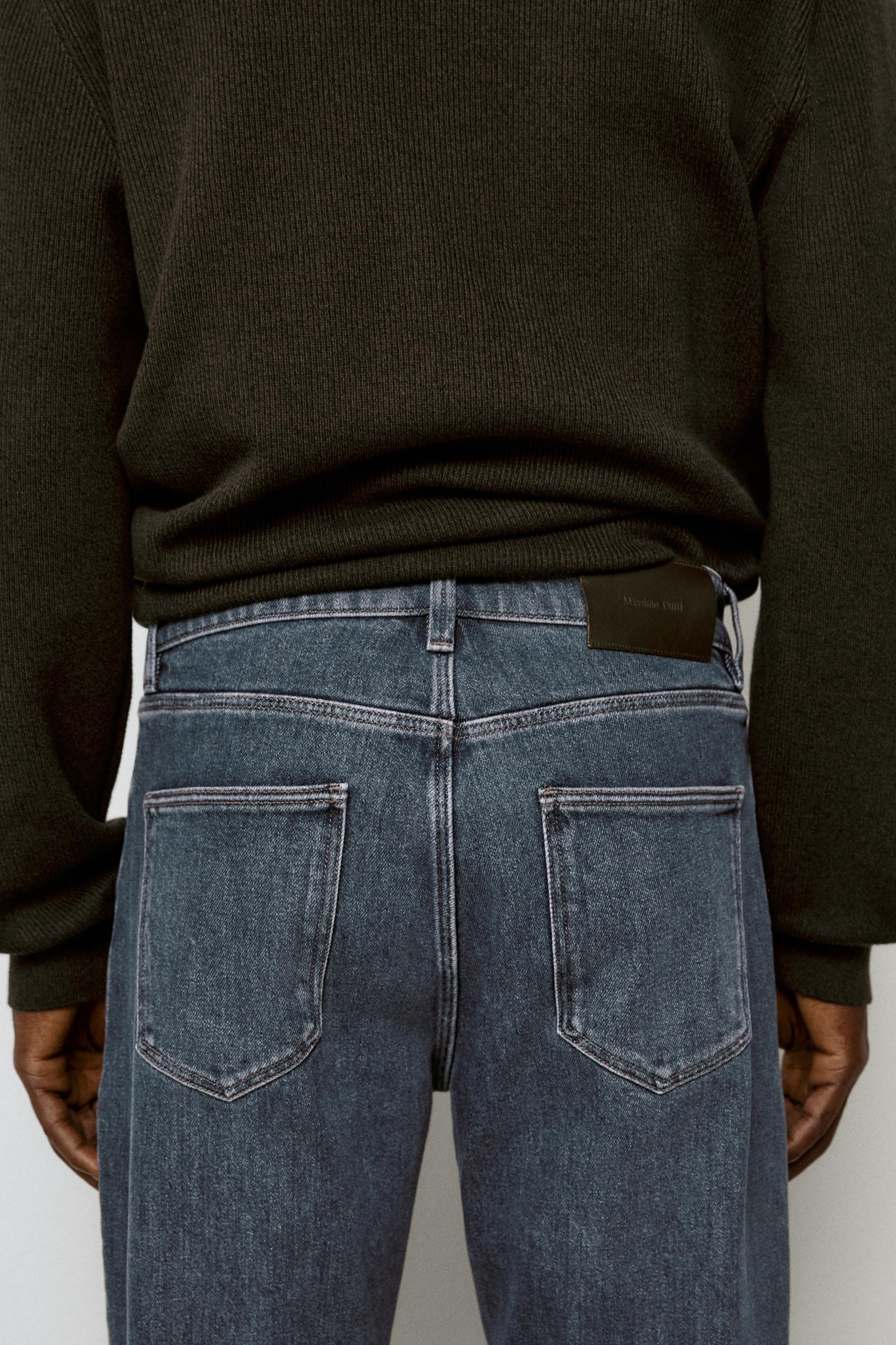 Enzymatic tapered fit jeans — DEEP BLUE
