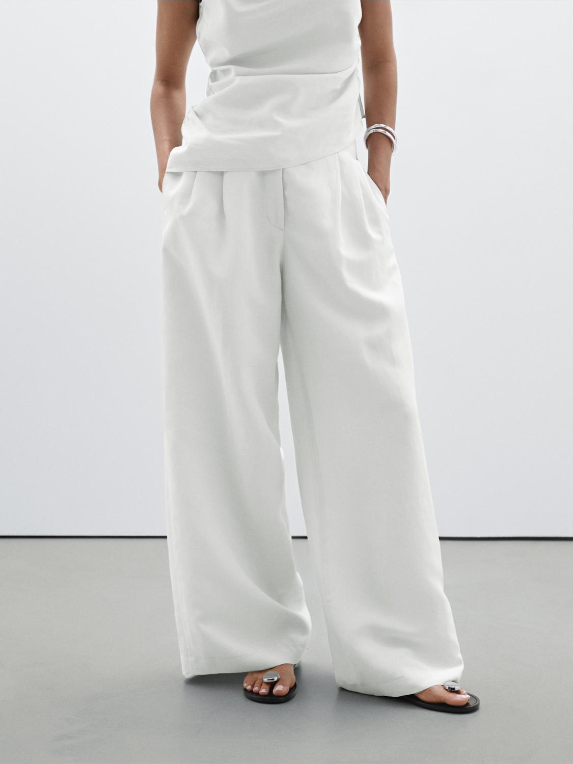 بنطلون فضفاض بقصة مستقيمة وبنسات