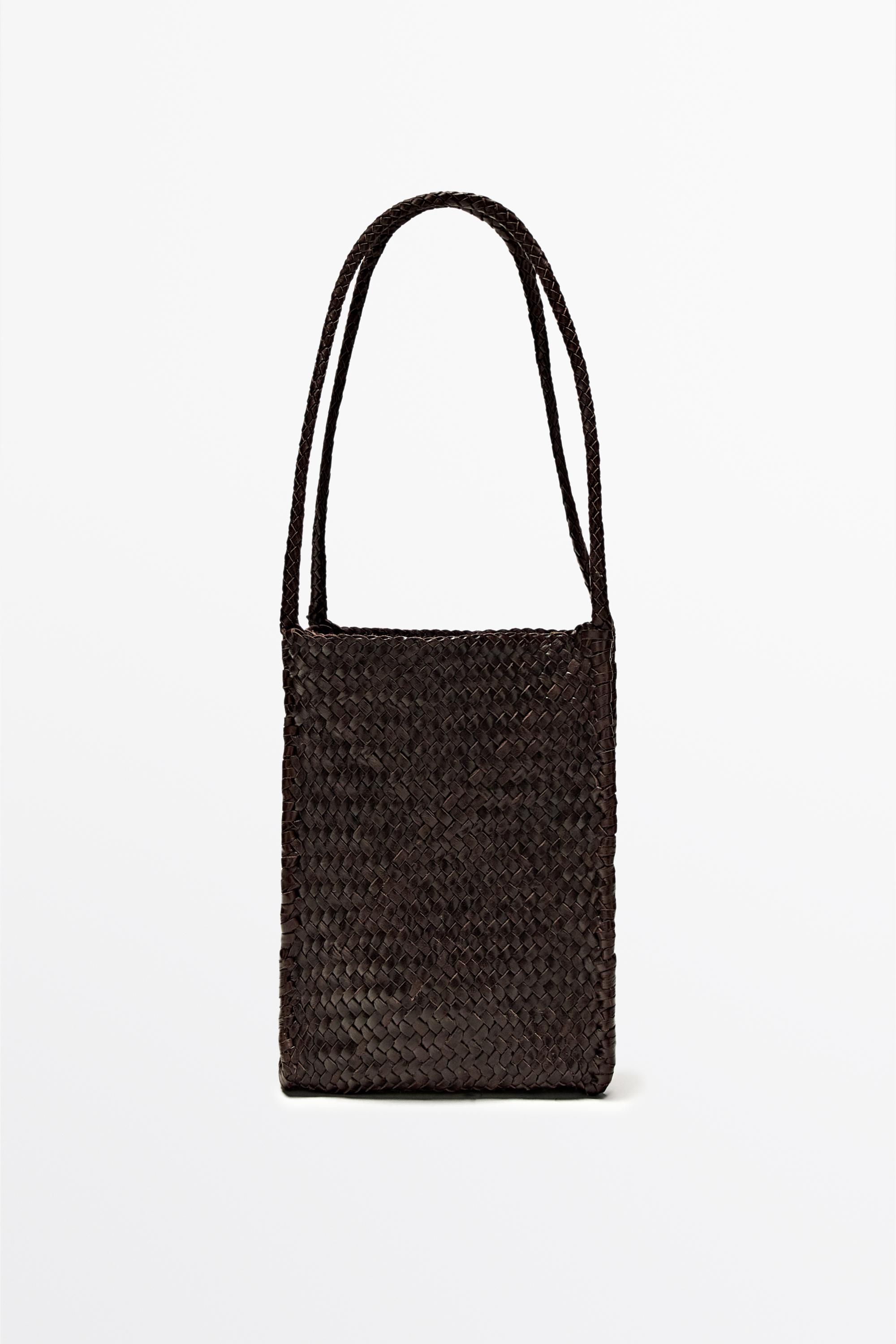 Nappa nahast punutud korvistiilis kott