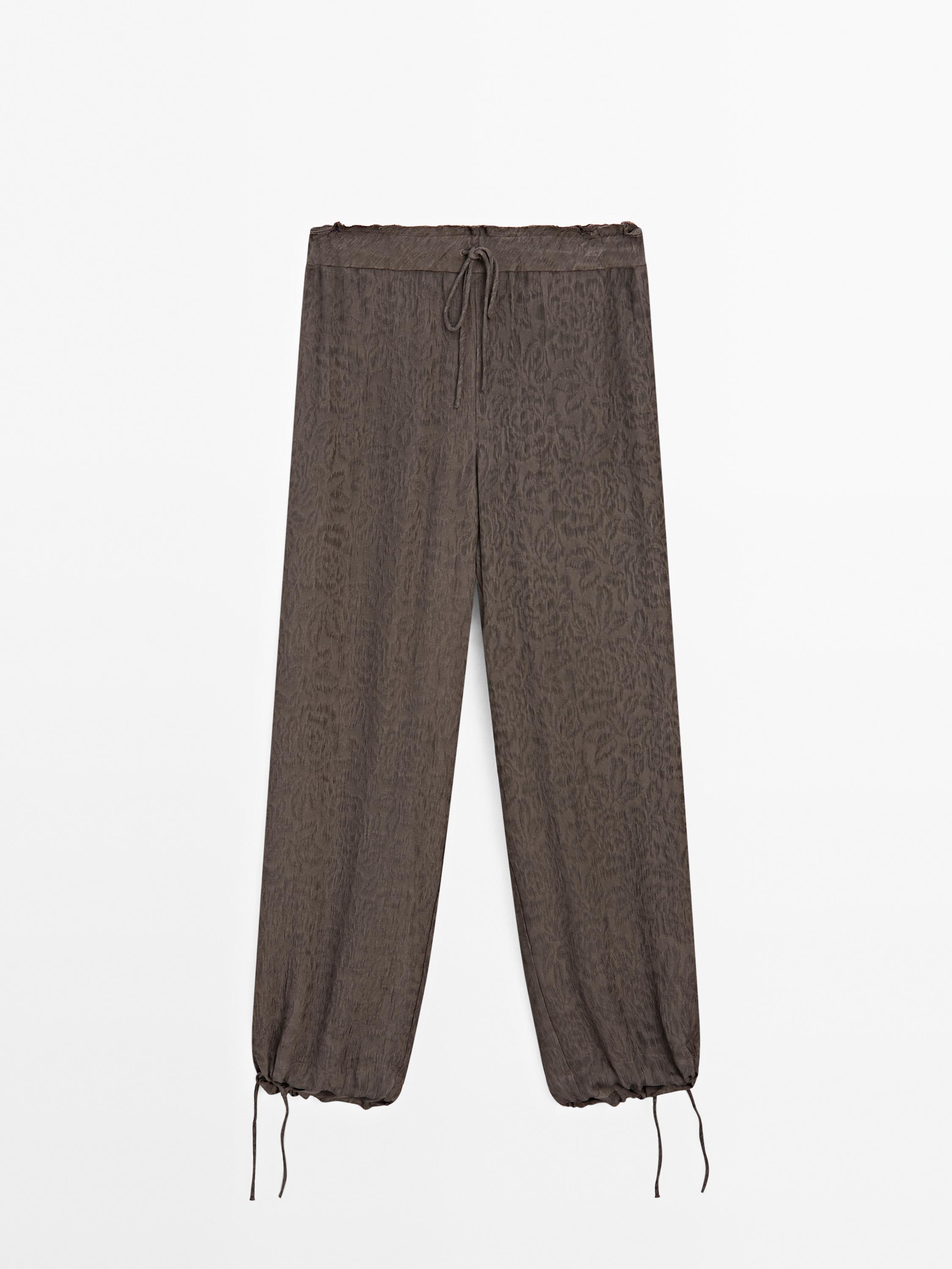 Flowing wide-leg jacquard trousers