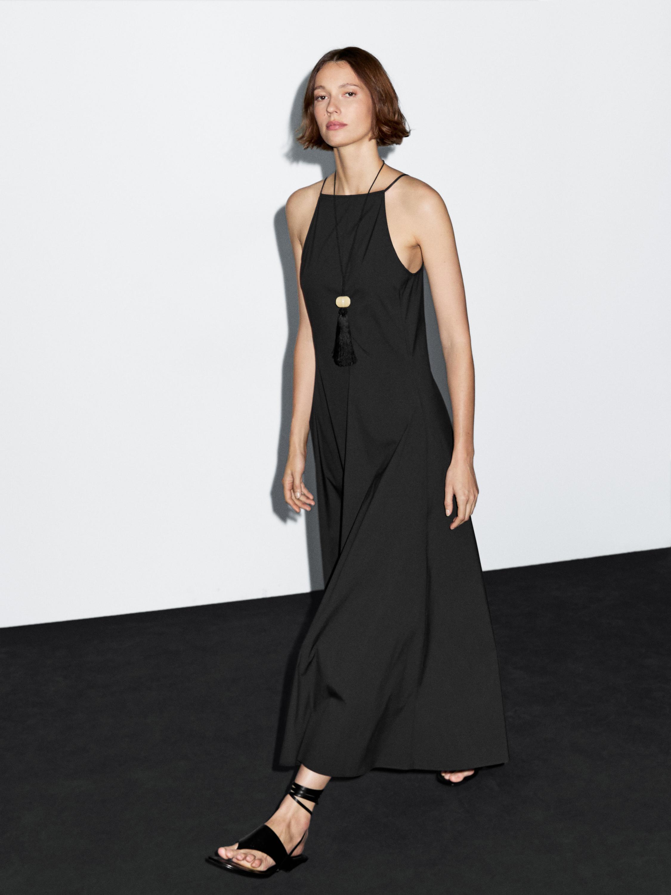 Long halter neck dress with flounce