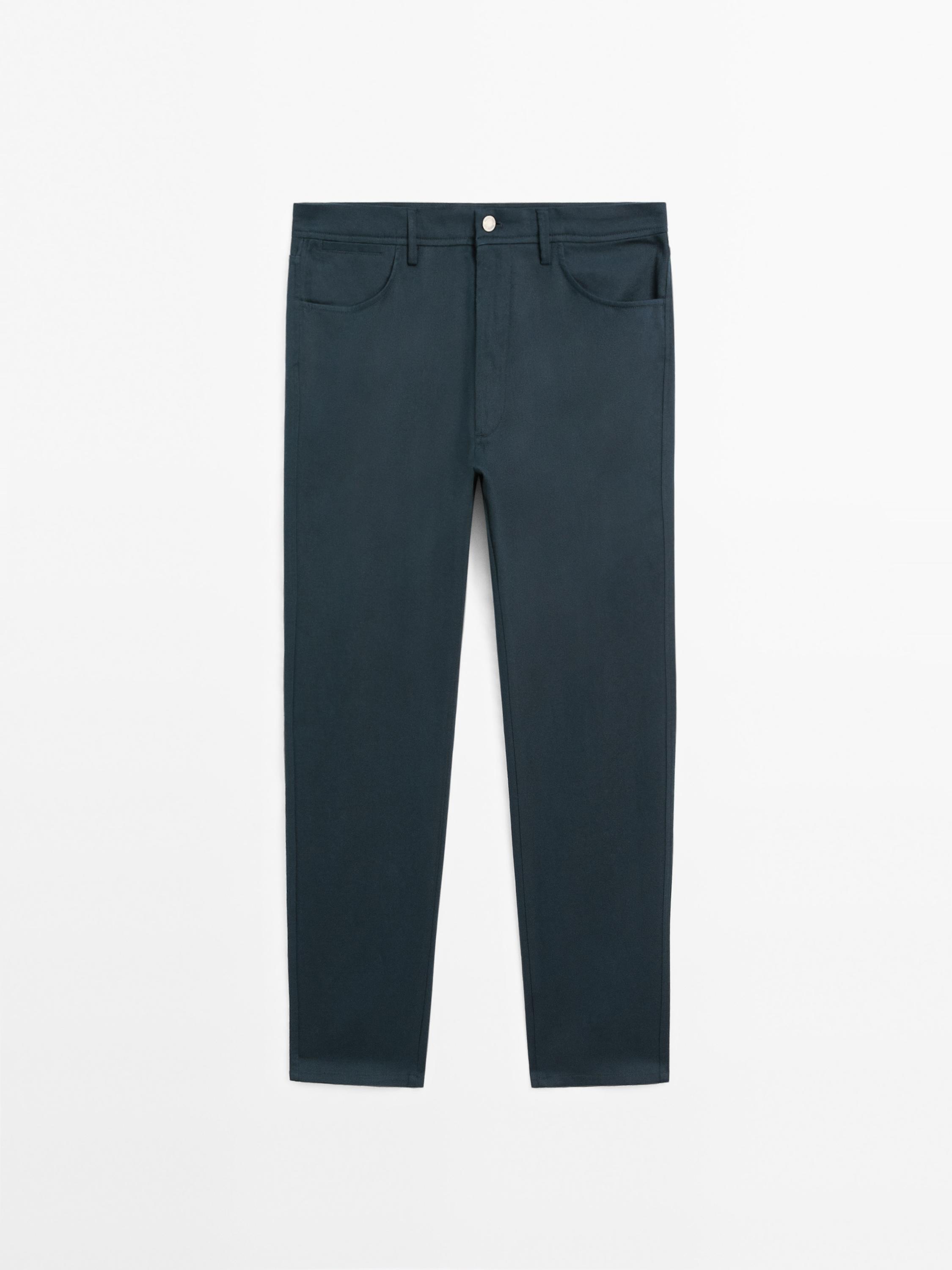 Faux jean tapered fit en coton mélangé