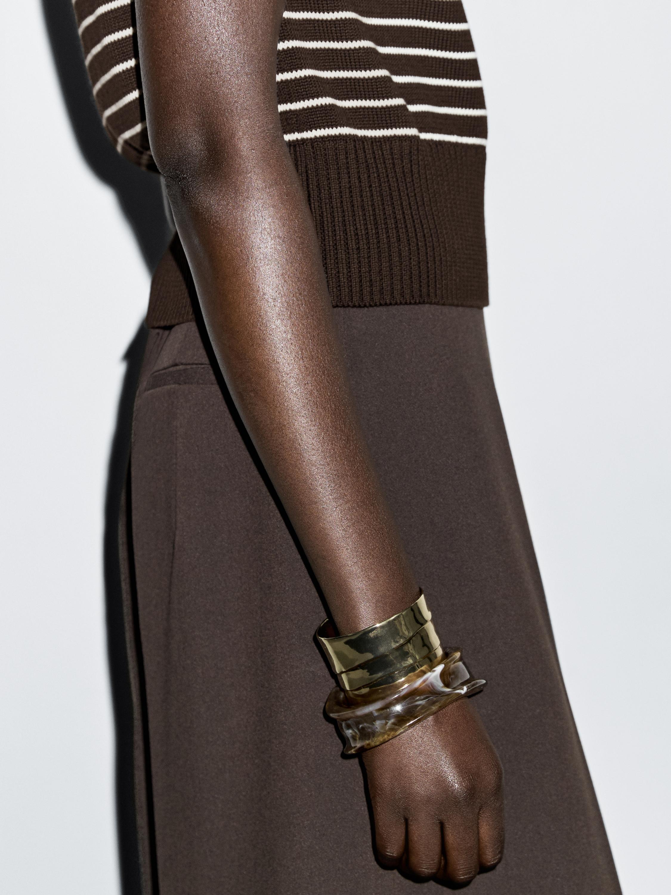 Striped vest with button details