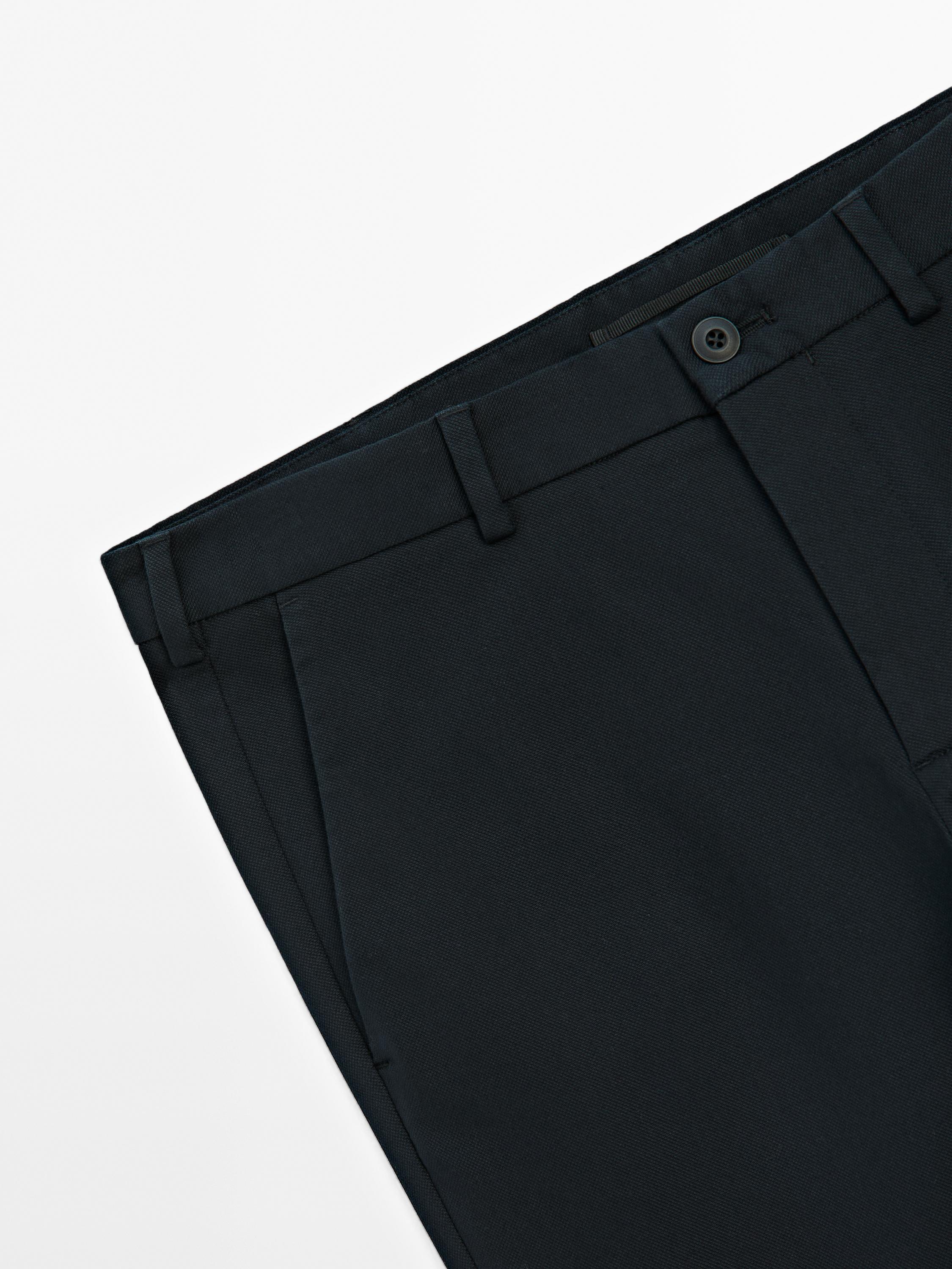 Cotton blend textured slim fit trousers