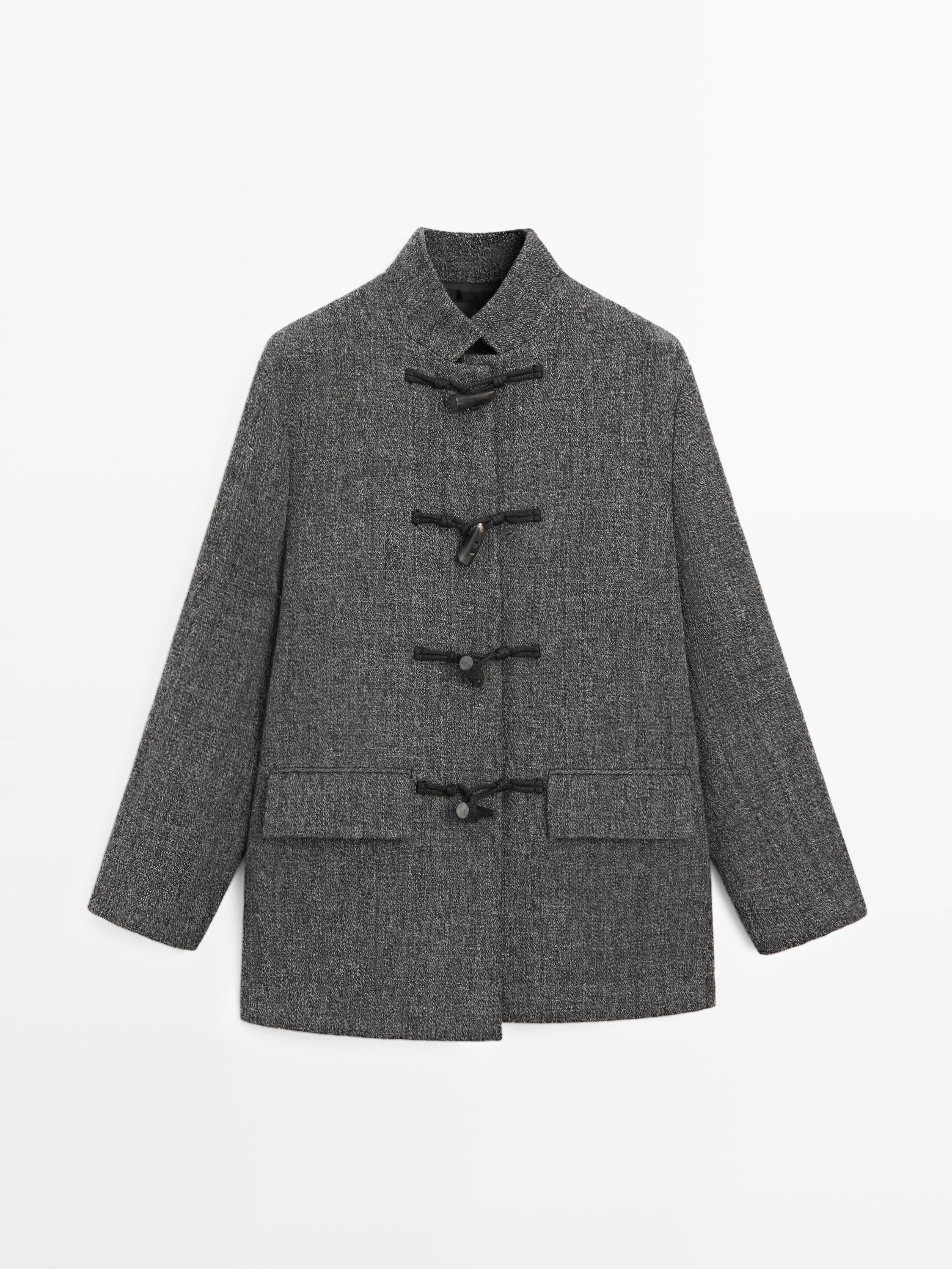 Mid-length coat with horn toggle