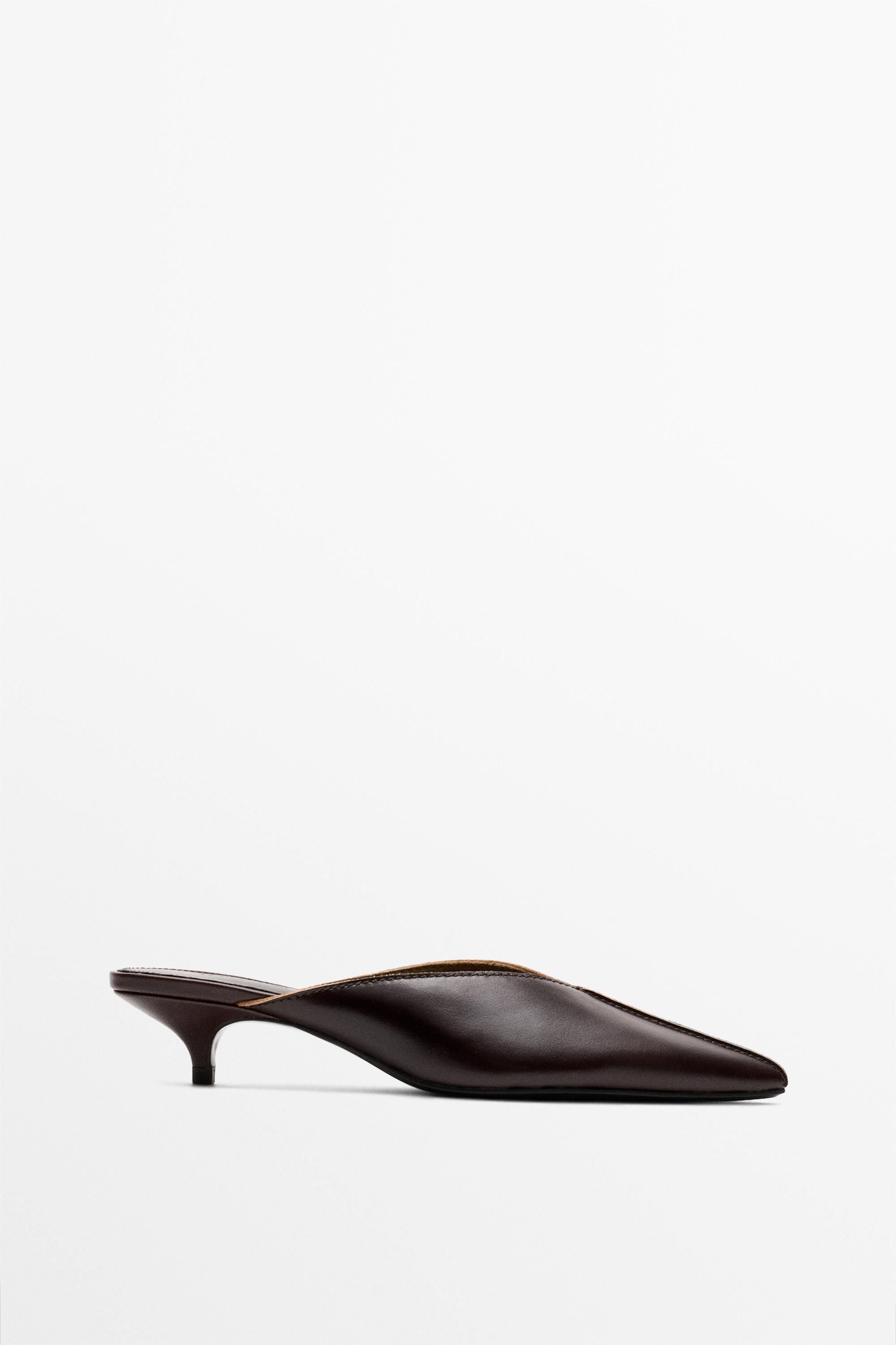 Heeled mule shoe