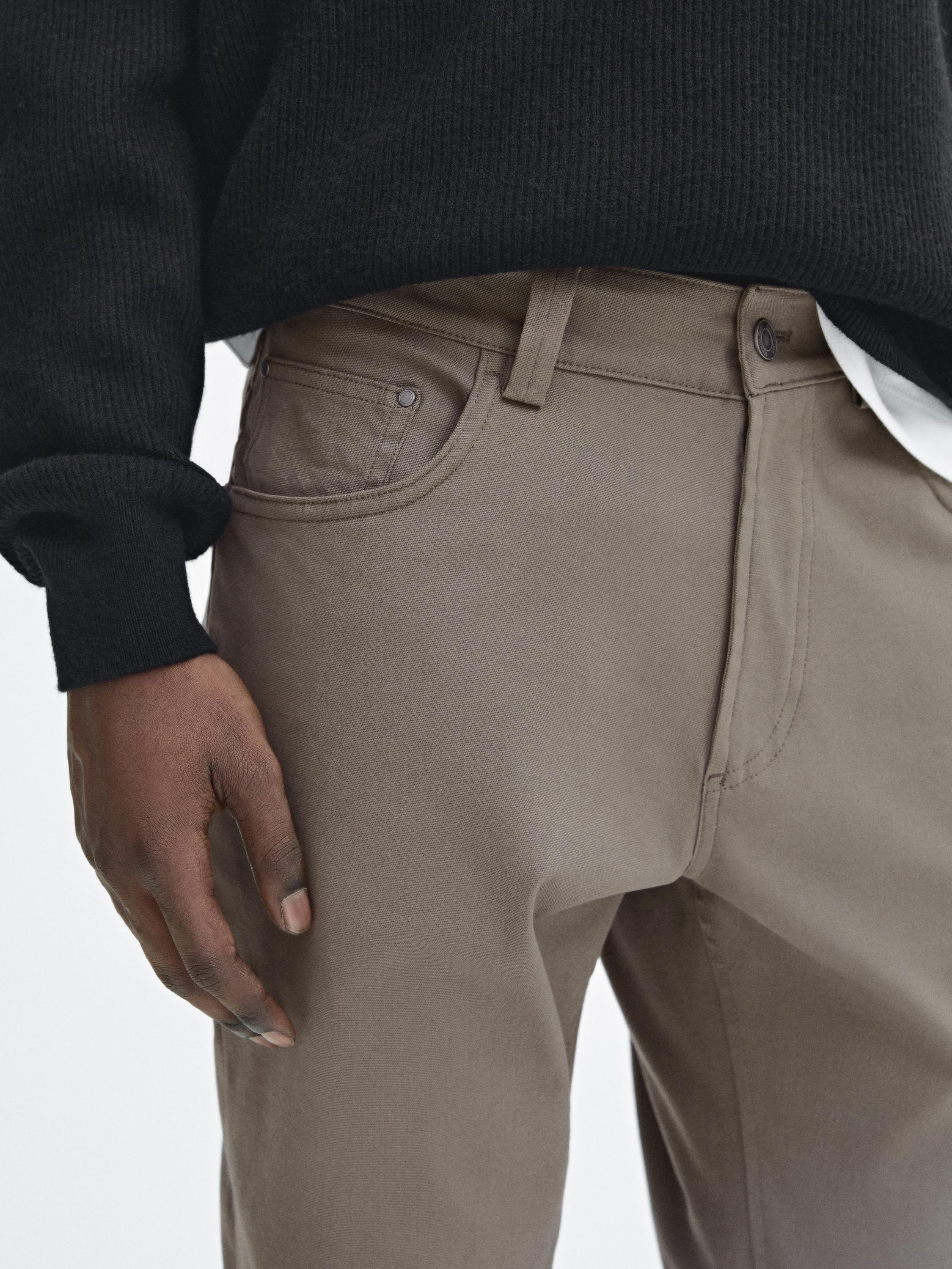 Cotton blend tapered fit jeans