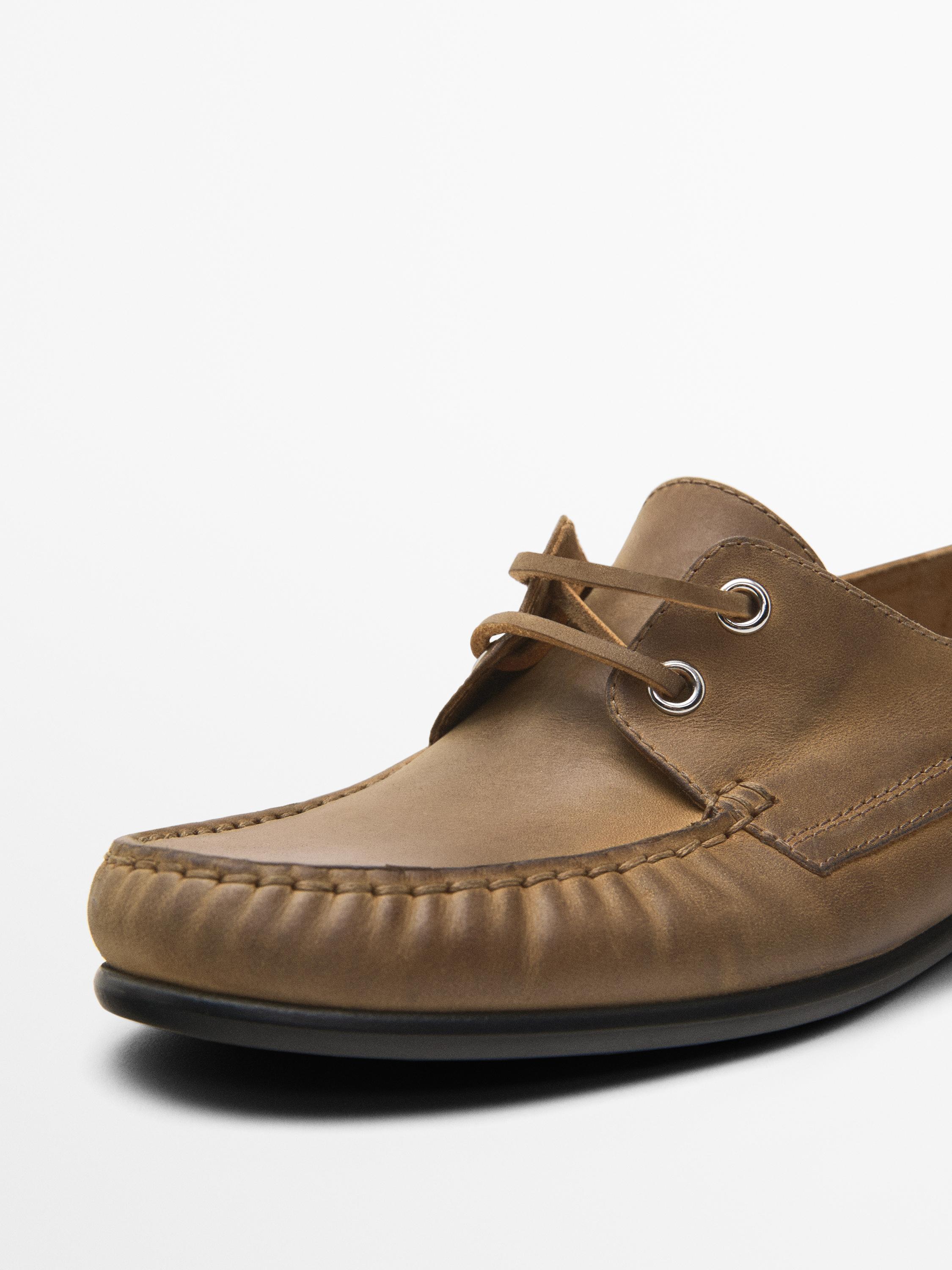 Oiled leather deck shoes