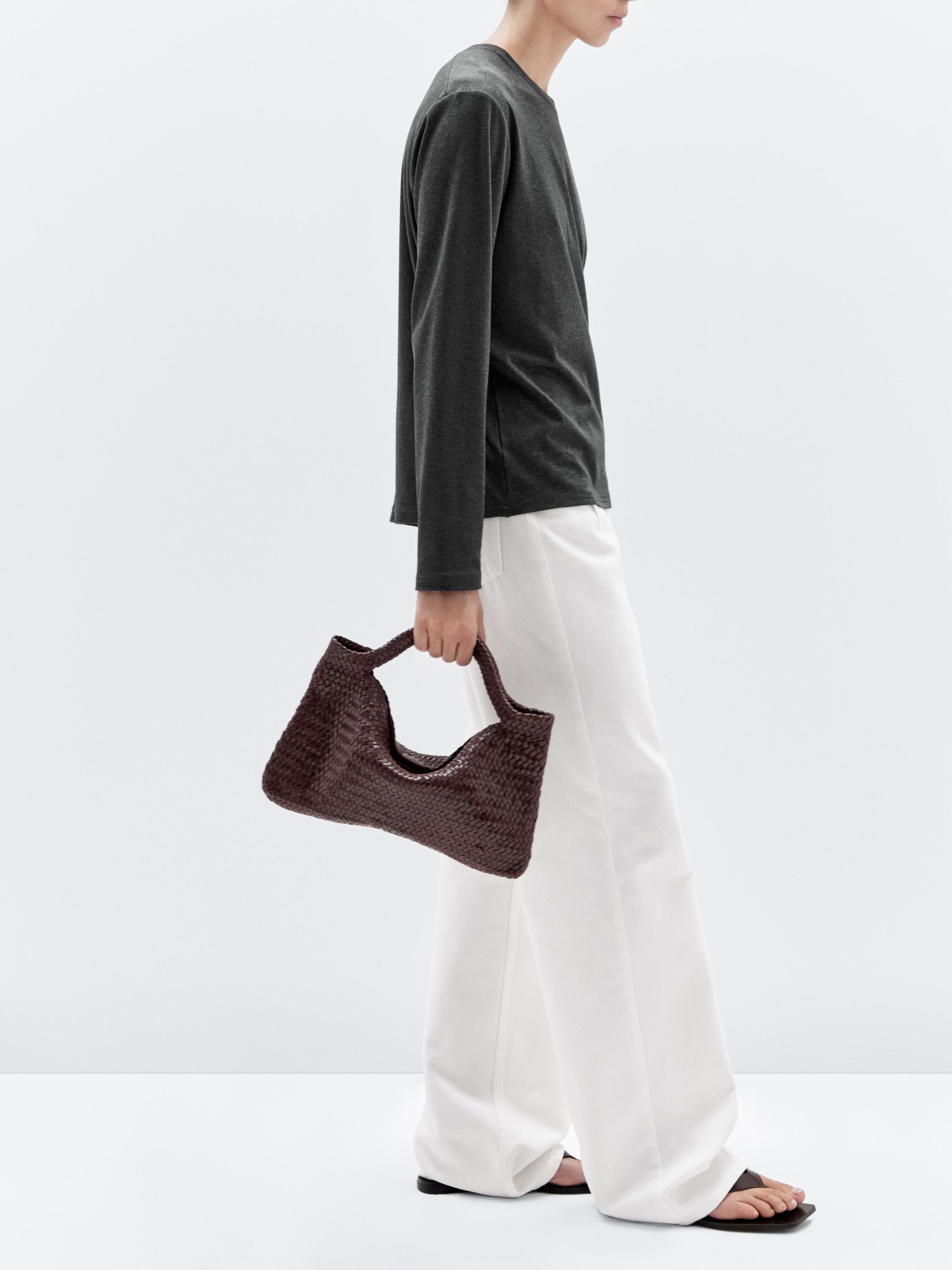 Srednje velika pletena torba od napa kože