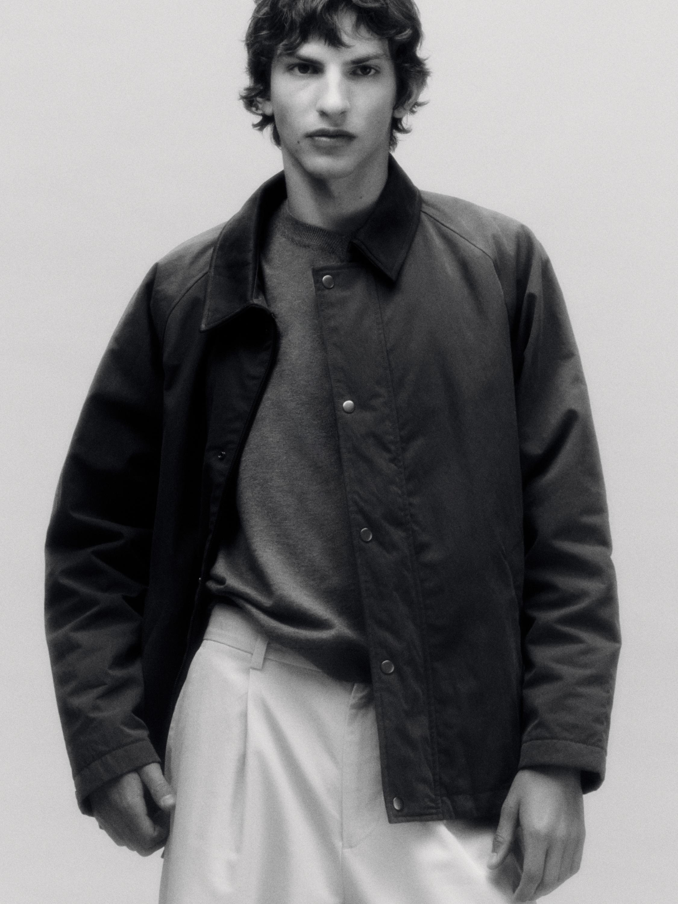 Jacket with leather collar detail