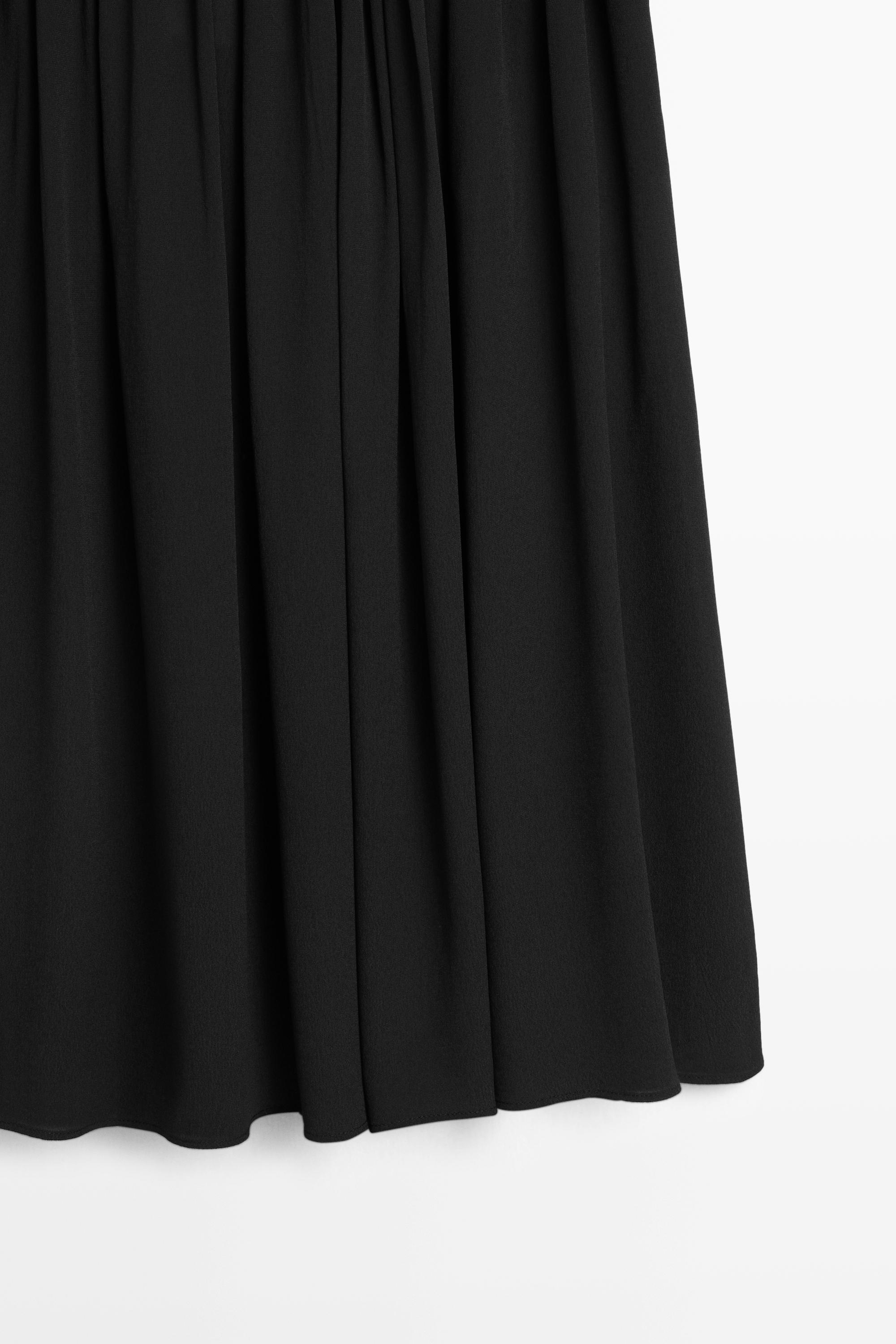 Pleated midi skirt — BLACK