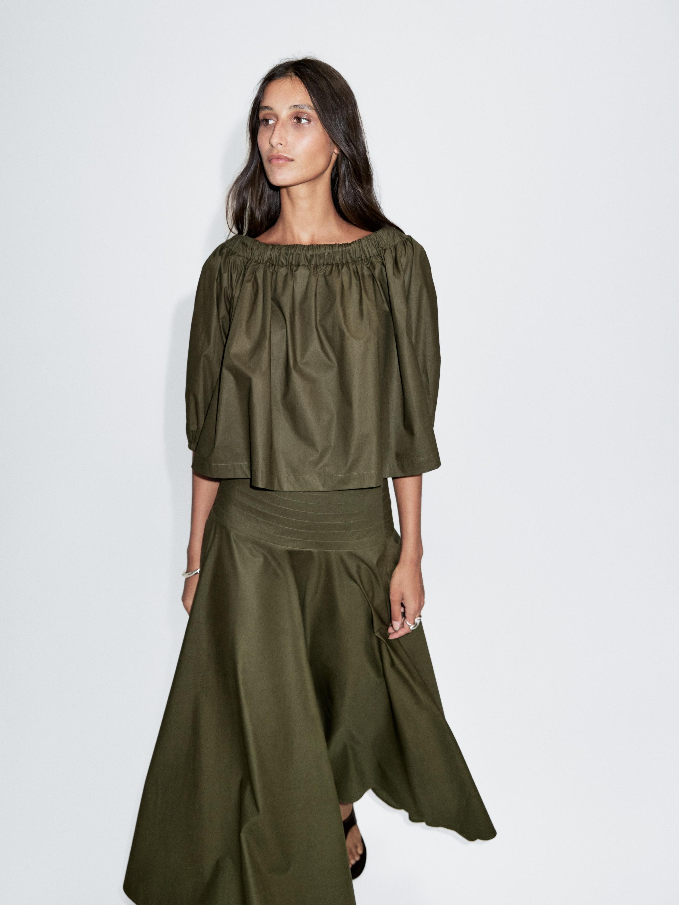 Top volumen escote barco