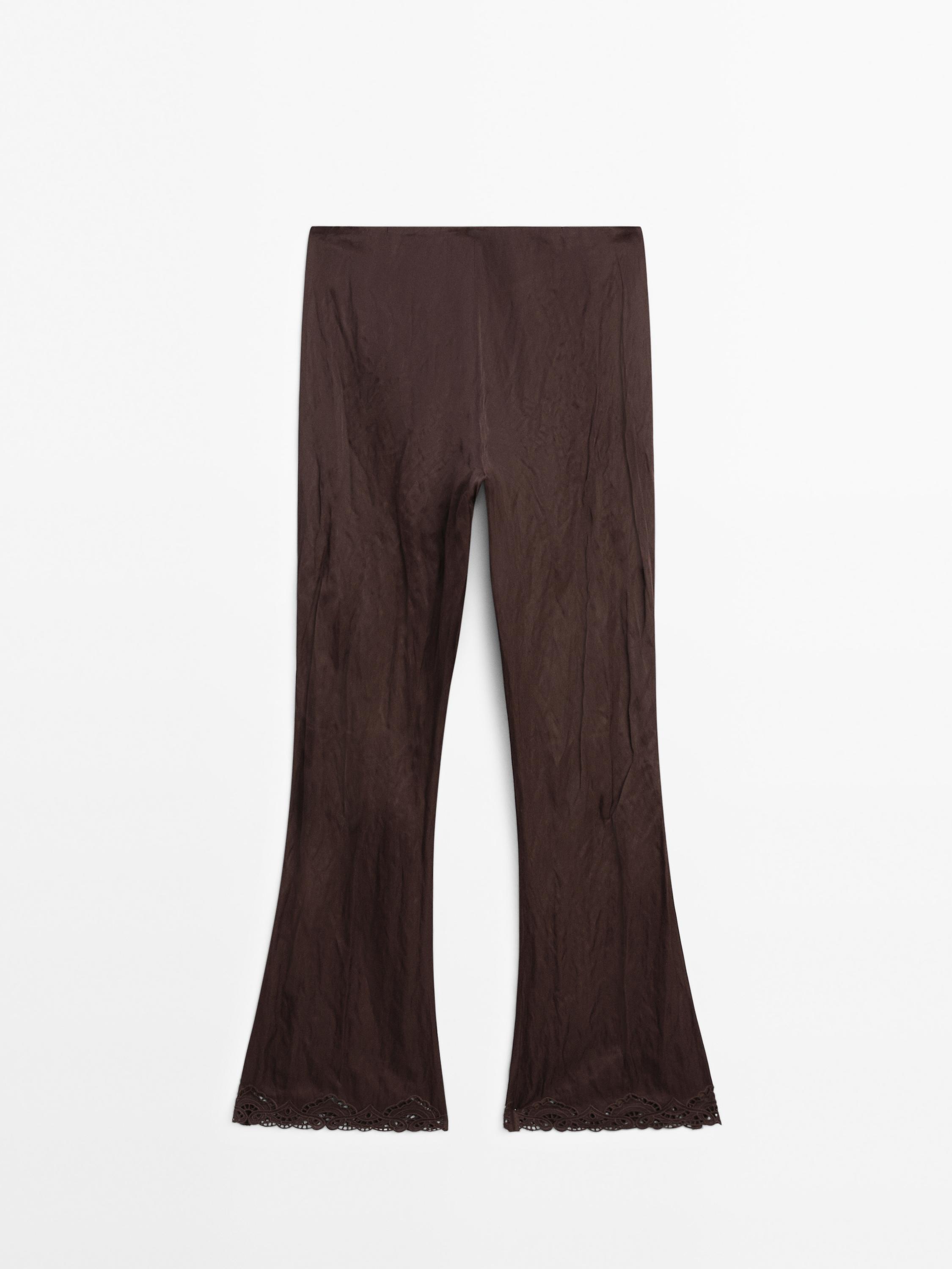 Capri trousers with blonde lace detail