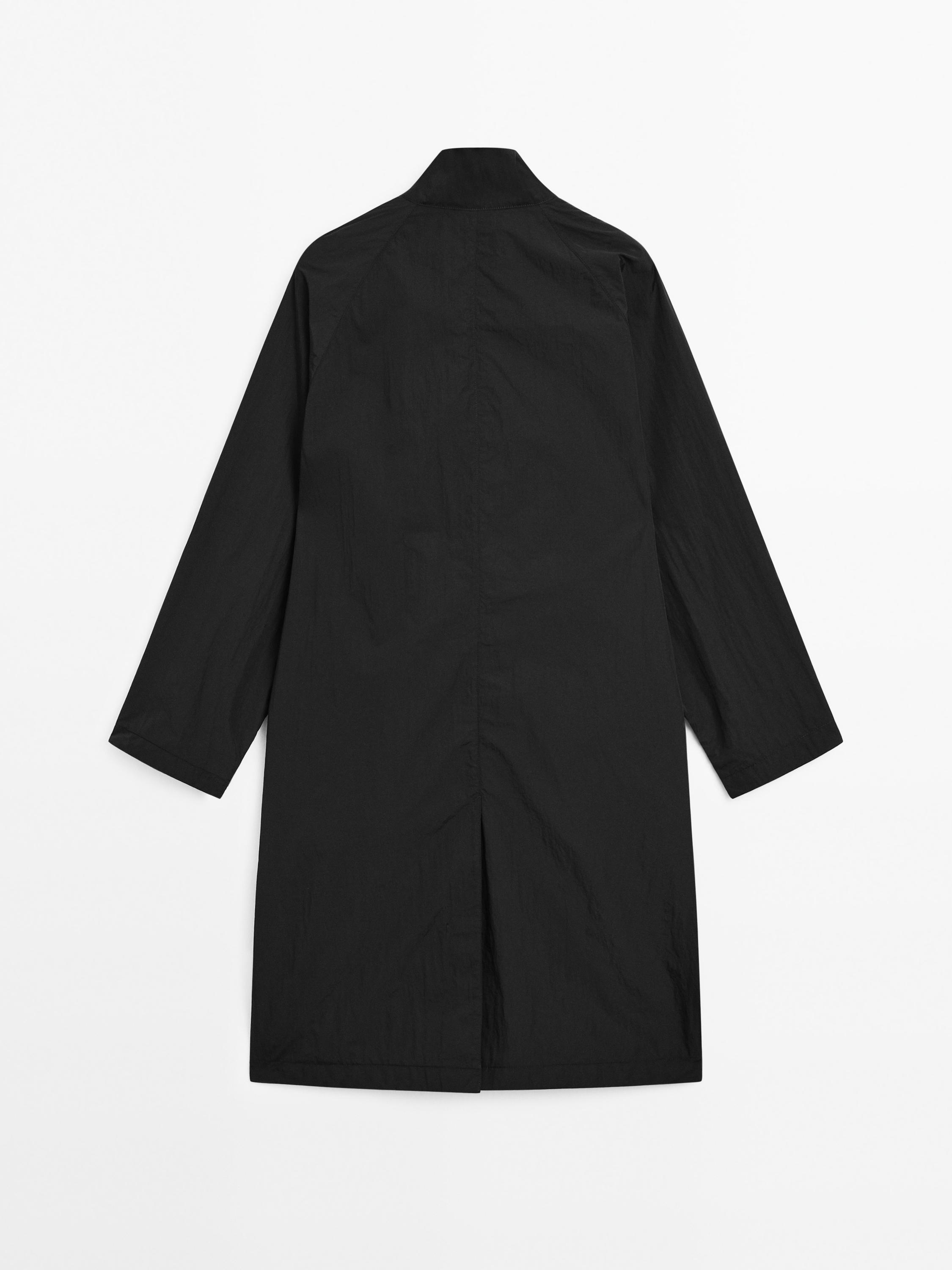 Oversize flowing trench coat in water-repellent fabric