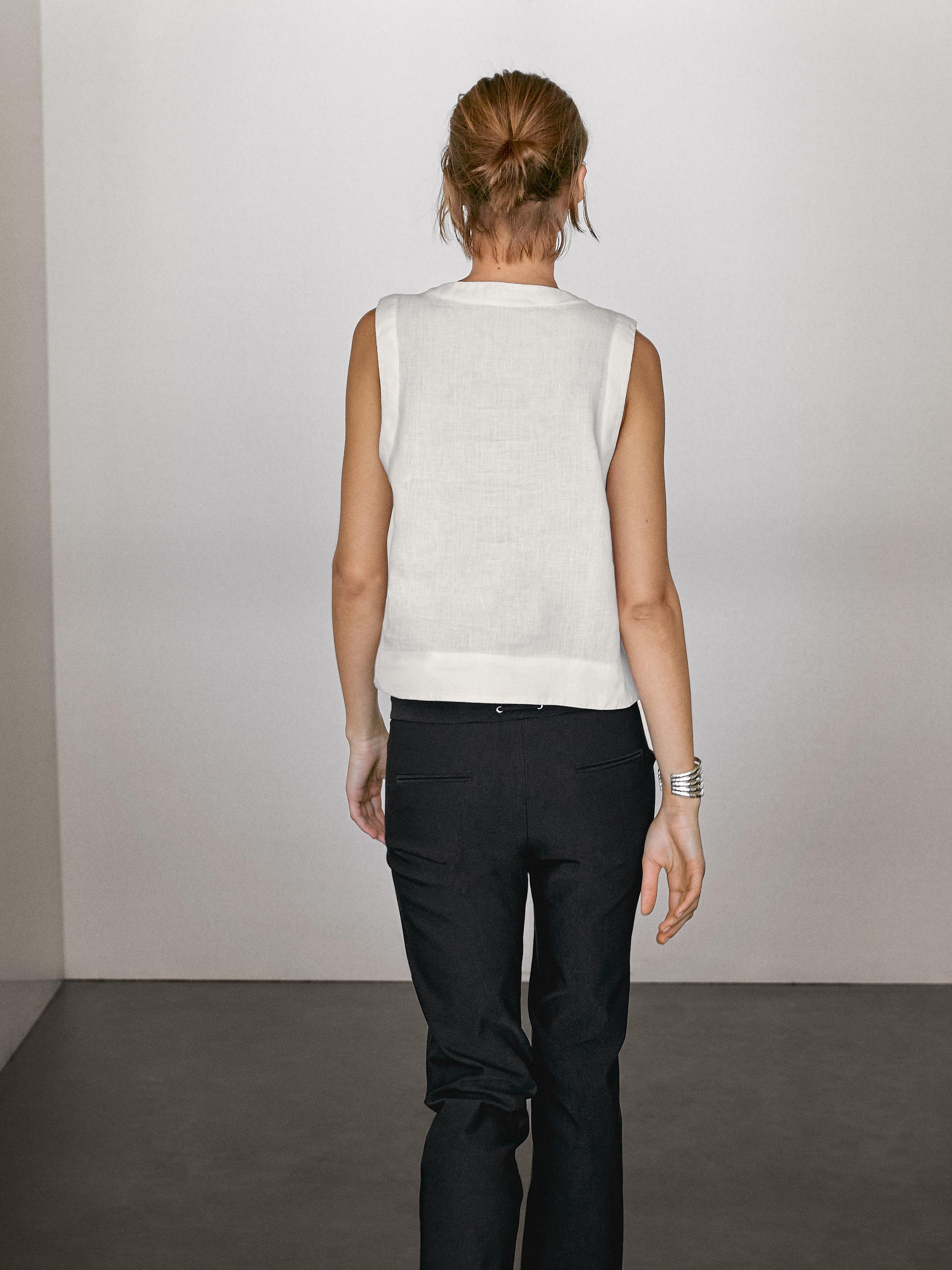 بلوزة كتان 100% مفصلة بدرزات