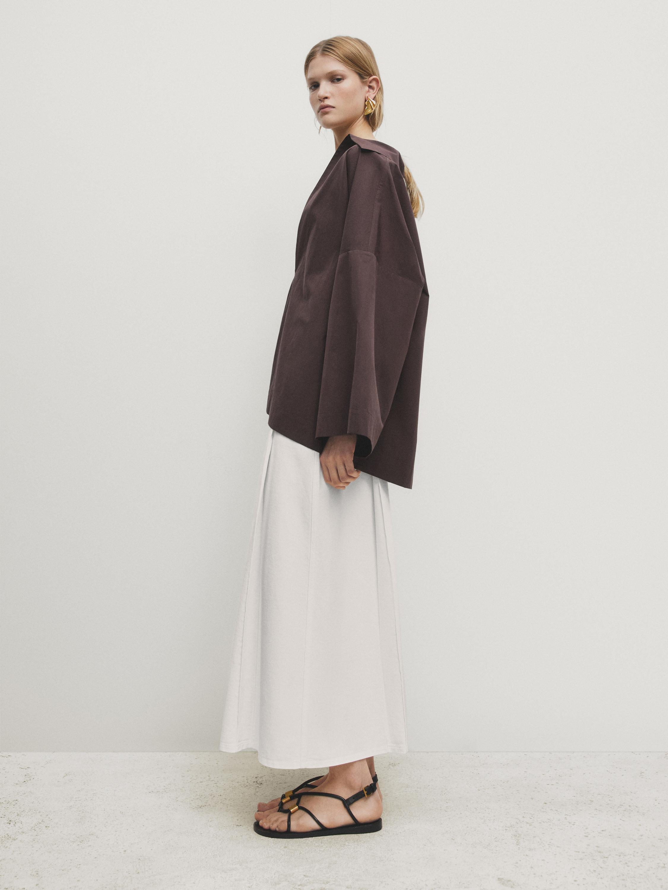 تنورة دنيم بليسيه