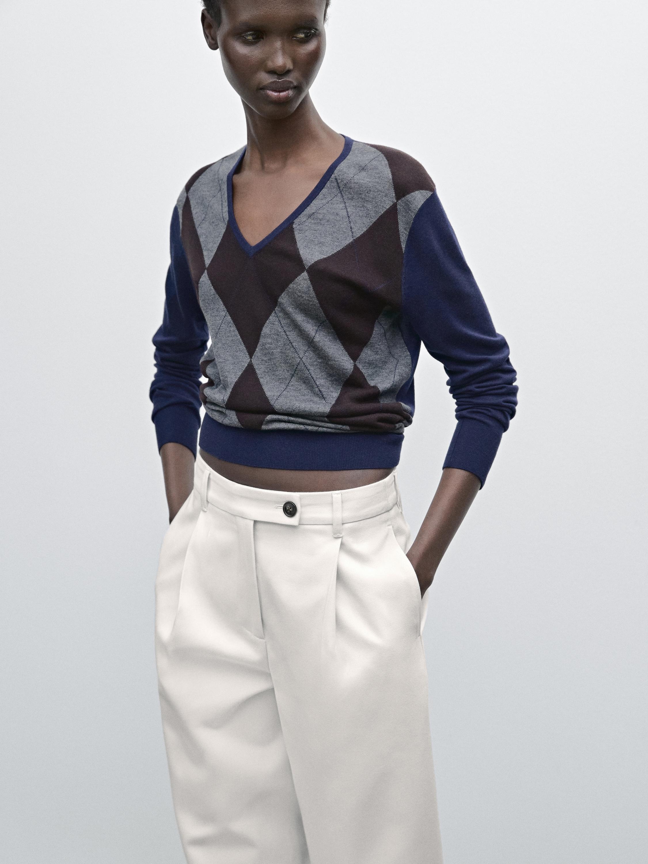 Wide-leg pleated cotton blend trousers