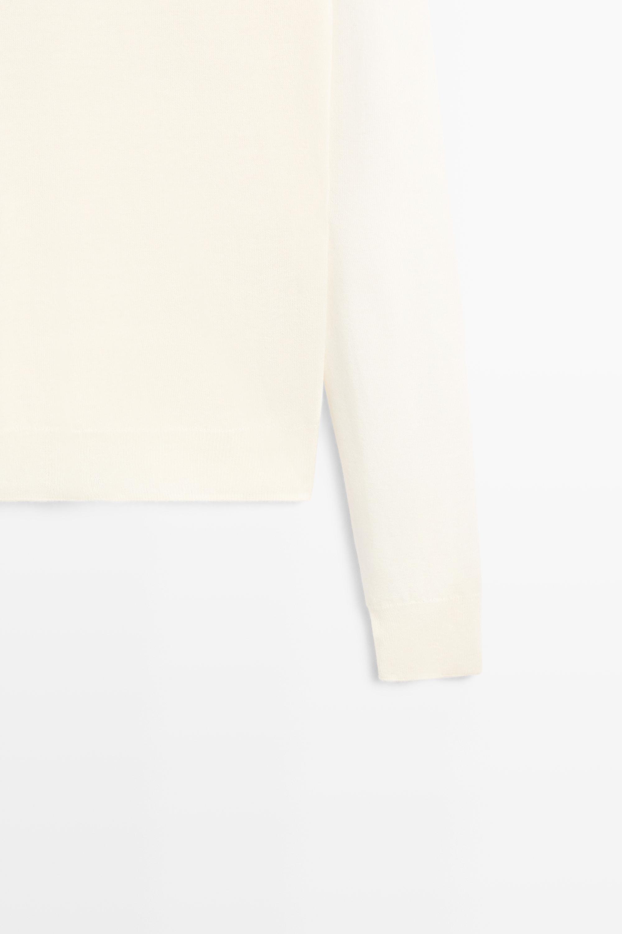 Wool-blend turtleneck knit sweater — CREAM