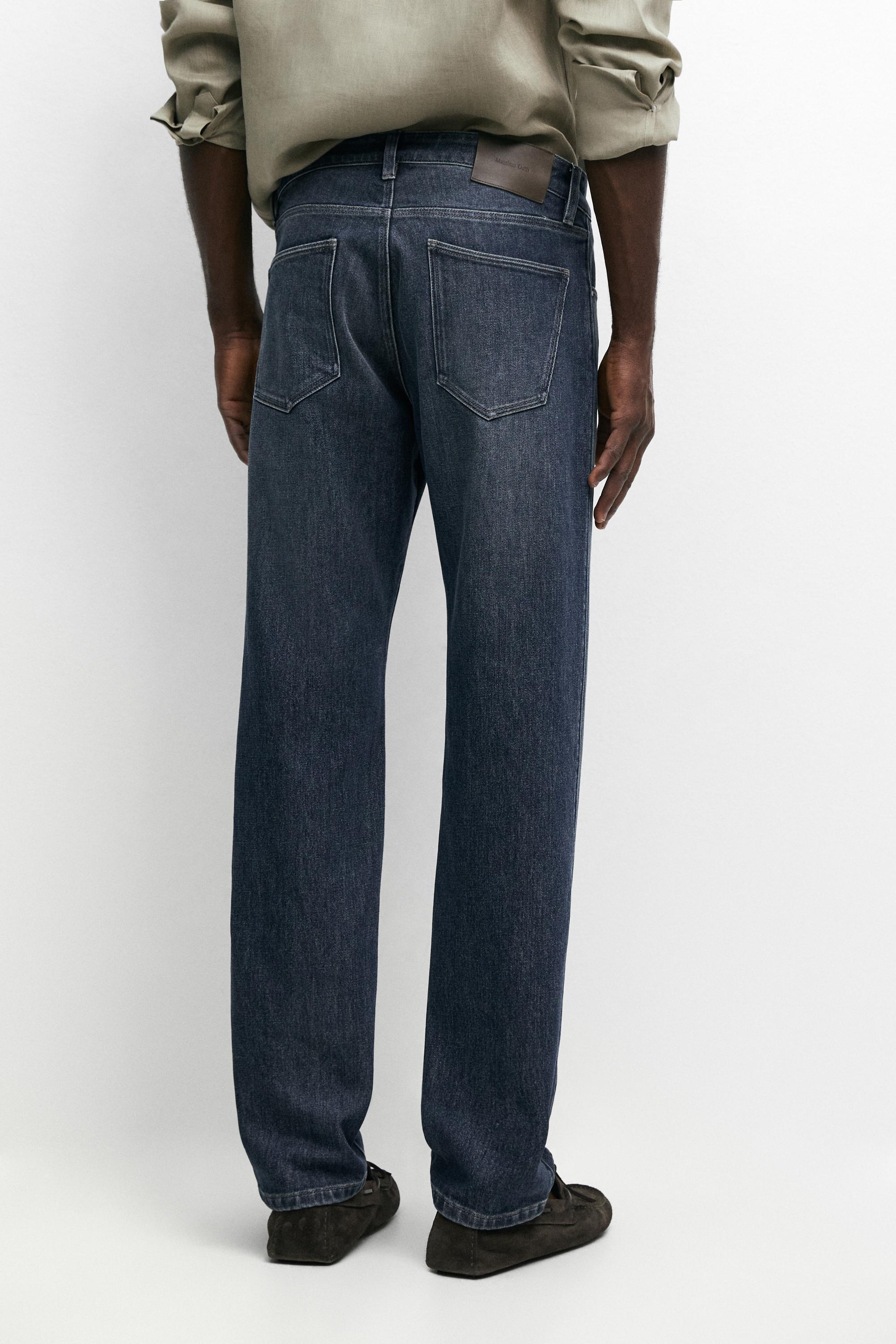 Enzymatic tapered fit jeans — DEEP BLUE