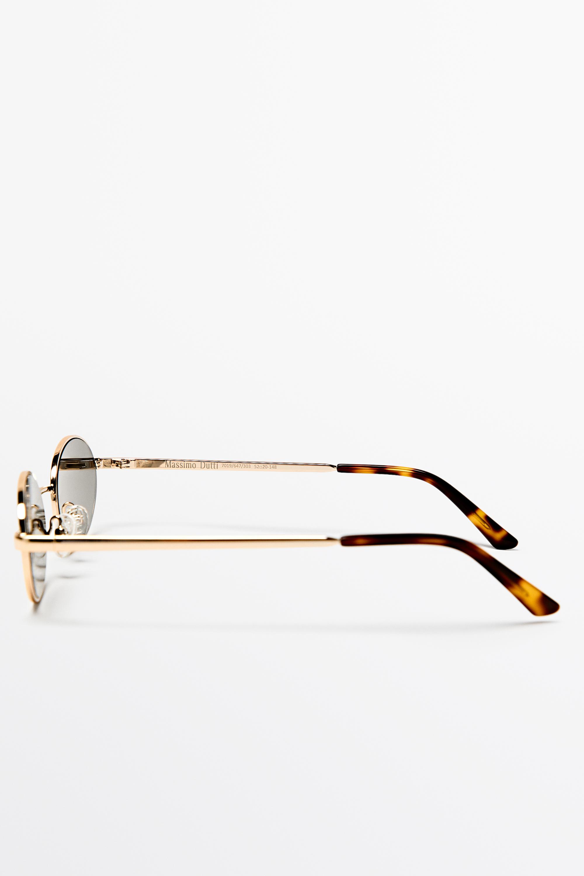Oval metal sunglasses — GOLDEN