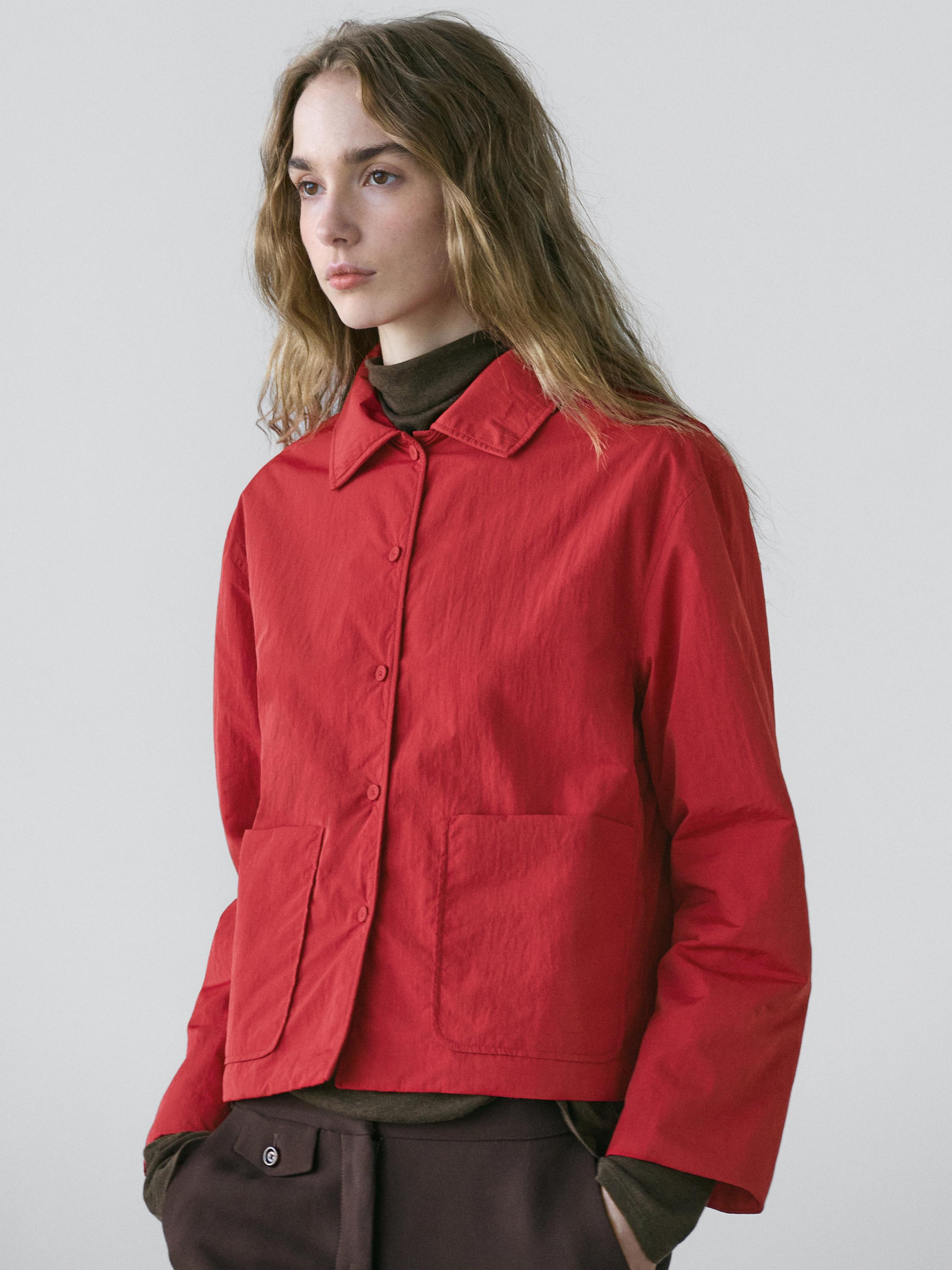 Short padded jacket with pockets