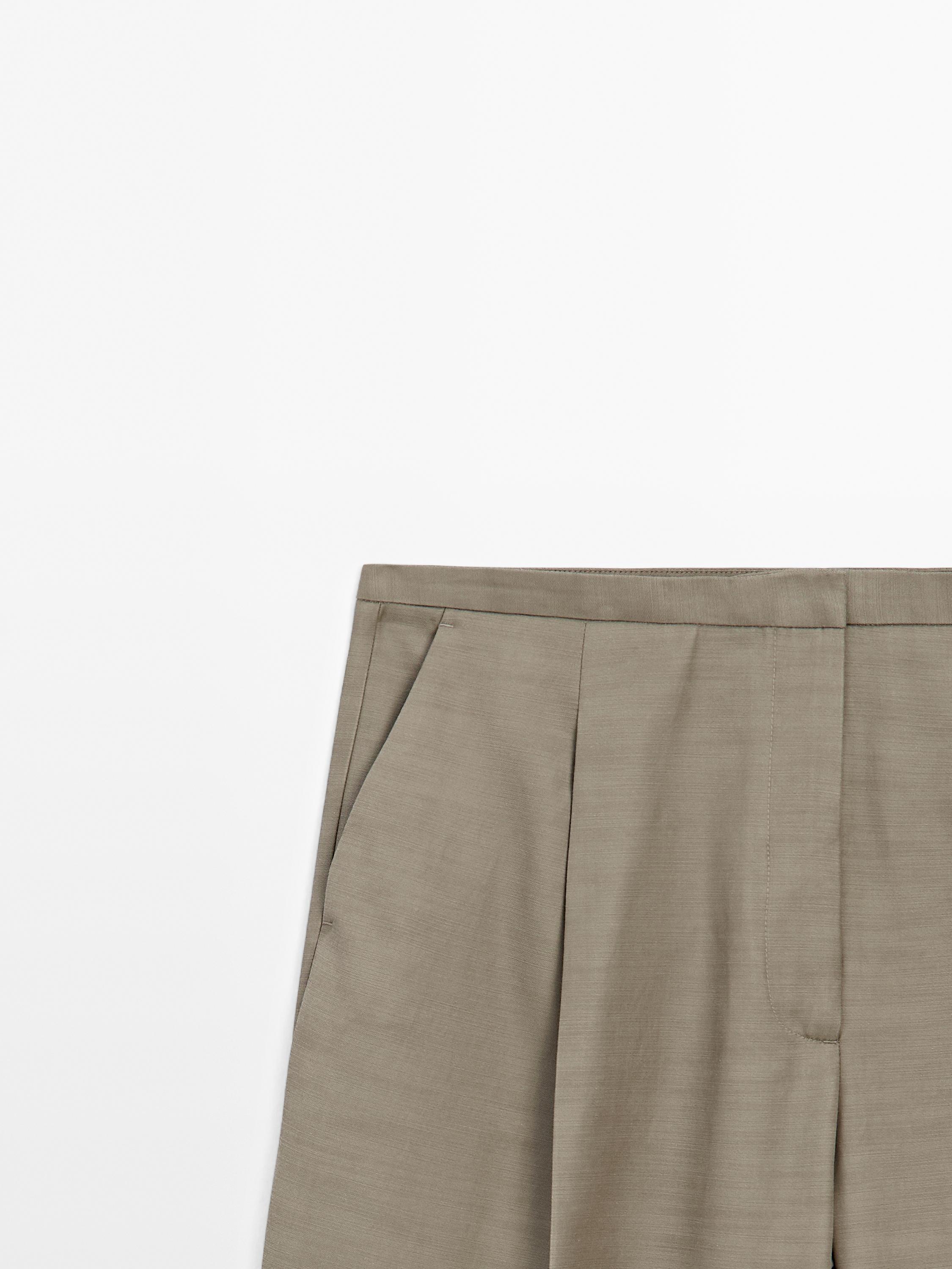 Darted trousers with thin waistband