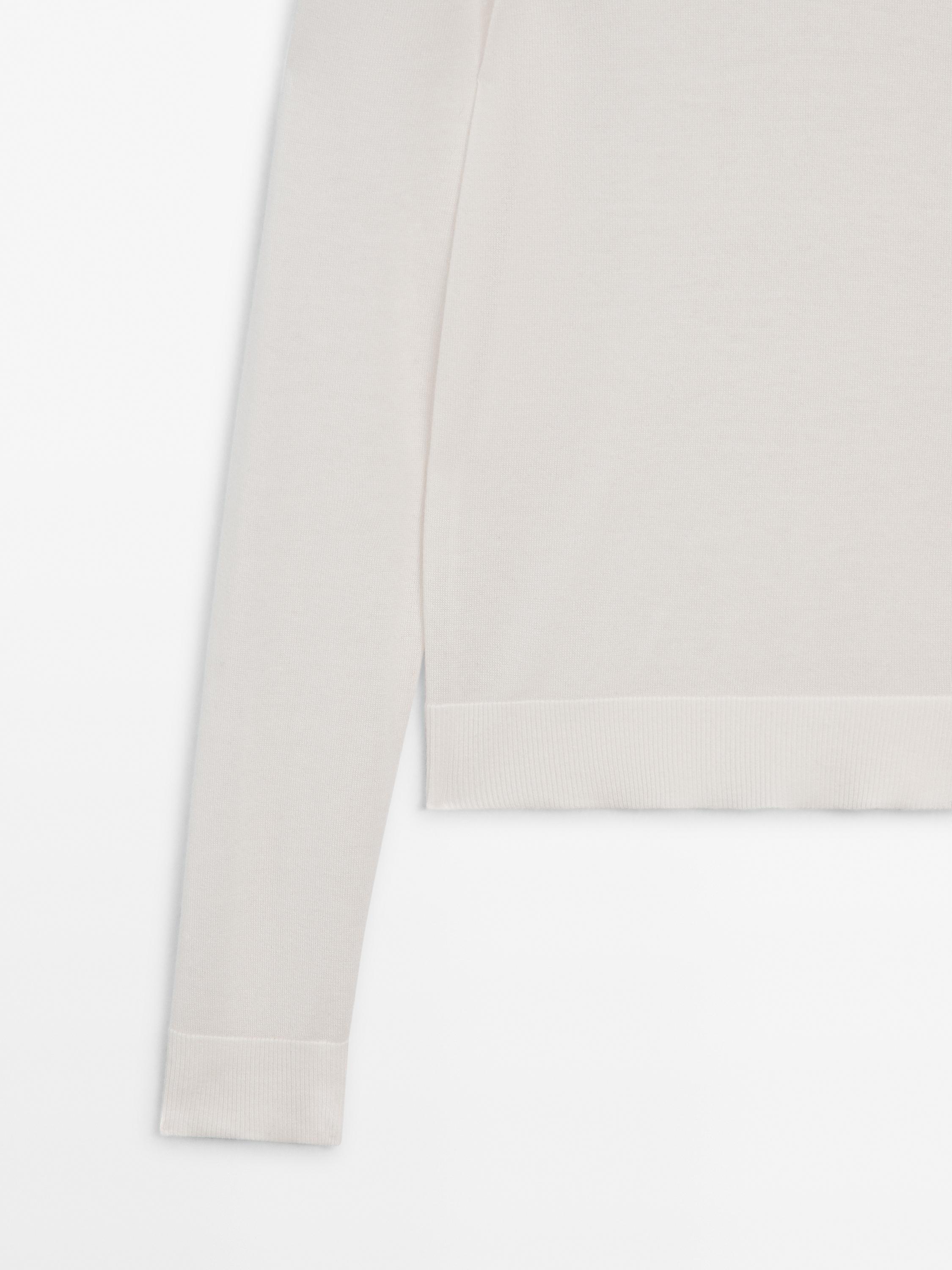 High neck knit jumper