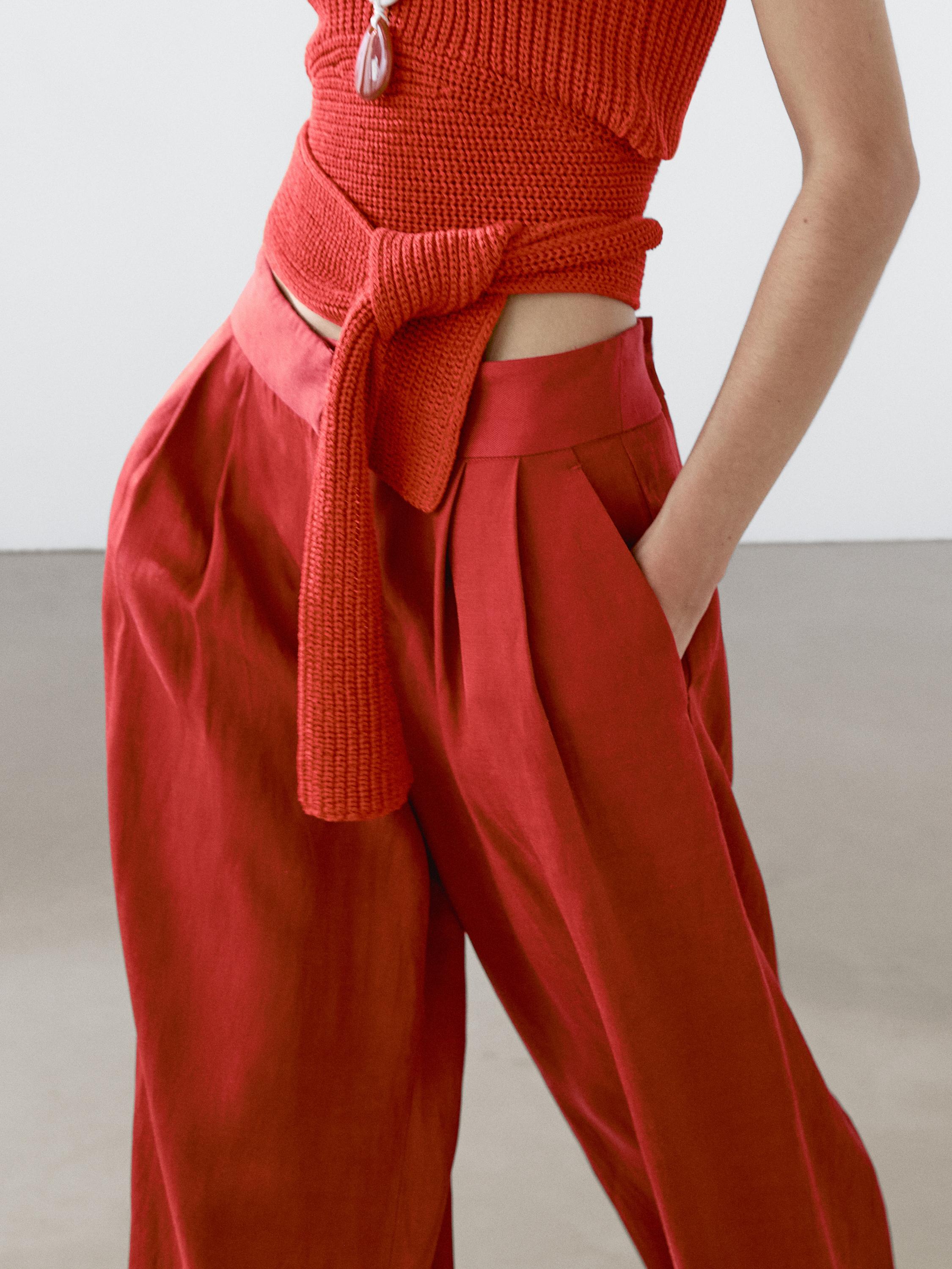 Струящиеся брюки с защипами