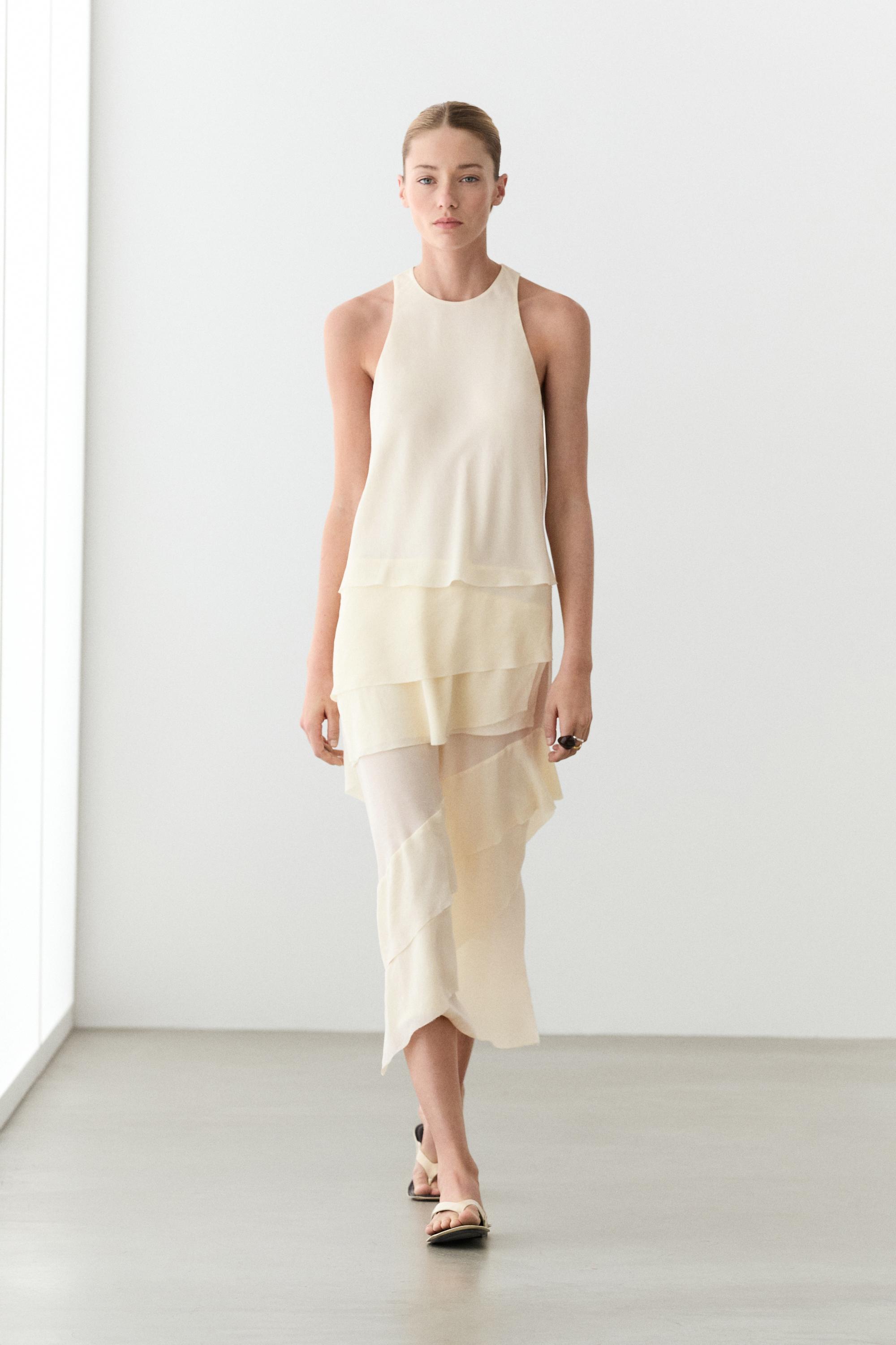 Flowing midi dress with ruffles — CREAM
