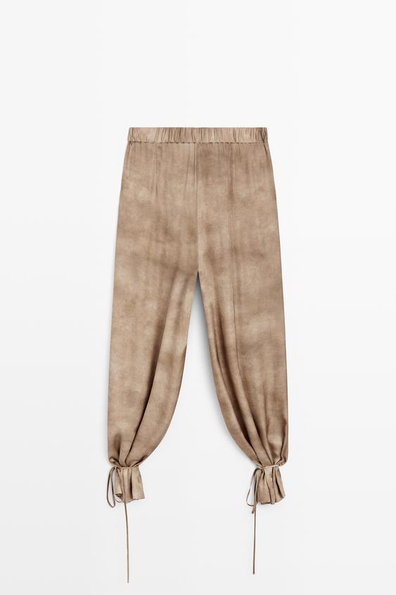 Bağcıklı paçalı dökümlü pantolon