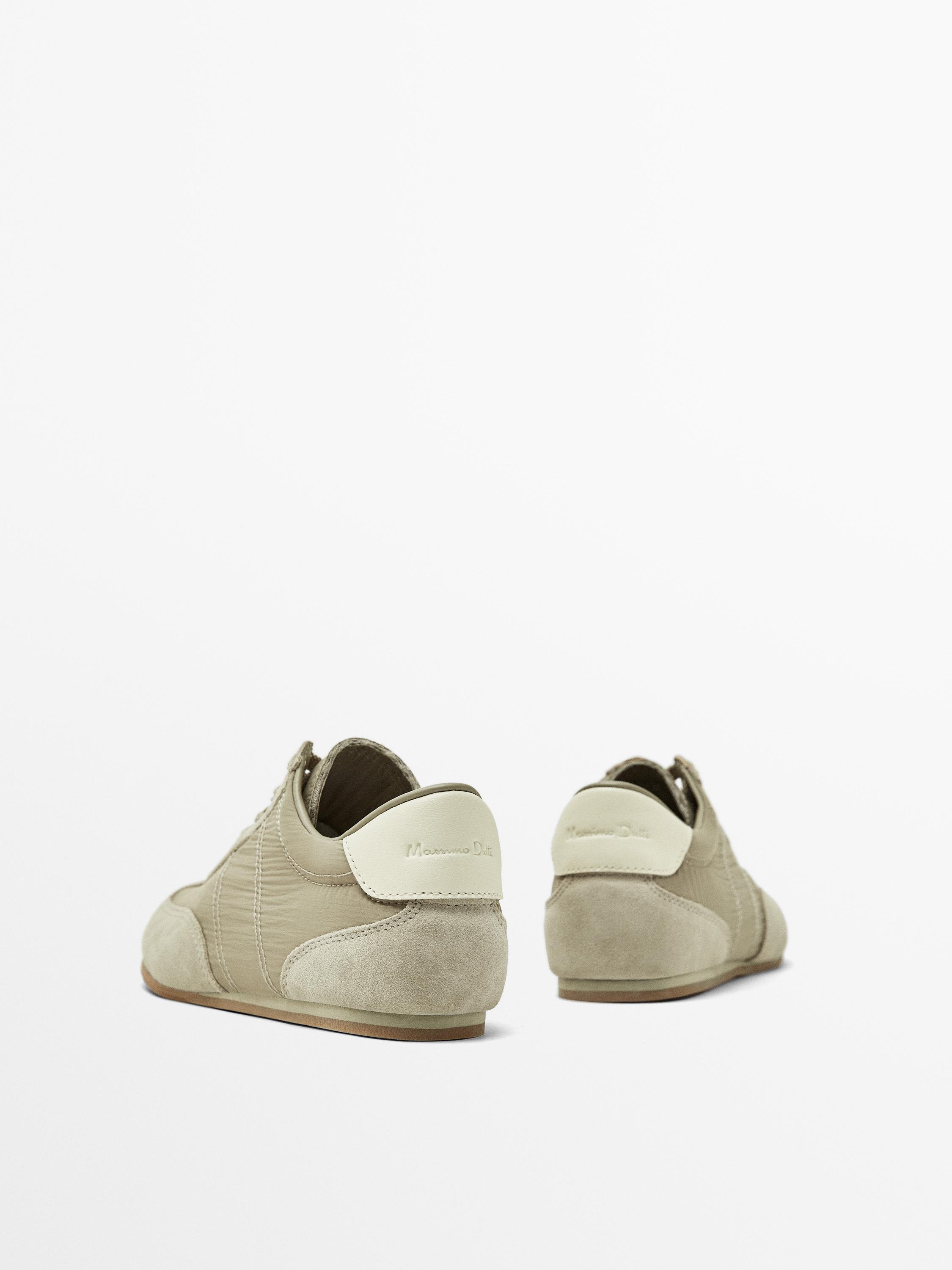 Sneaker aus kombiniertem Stoff
