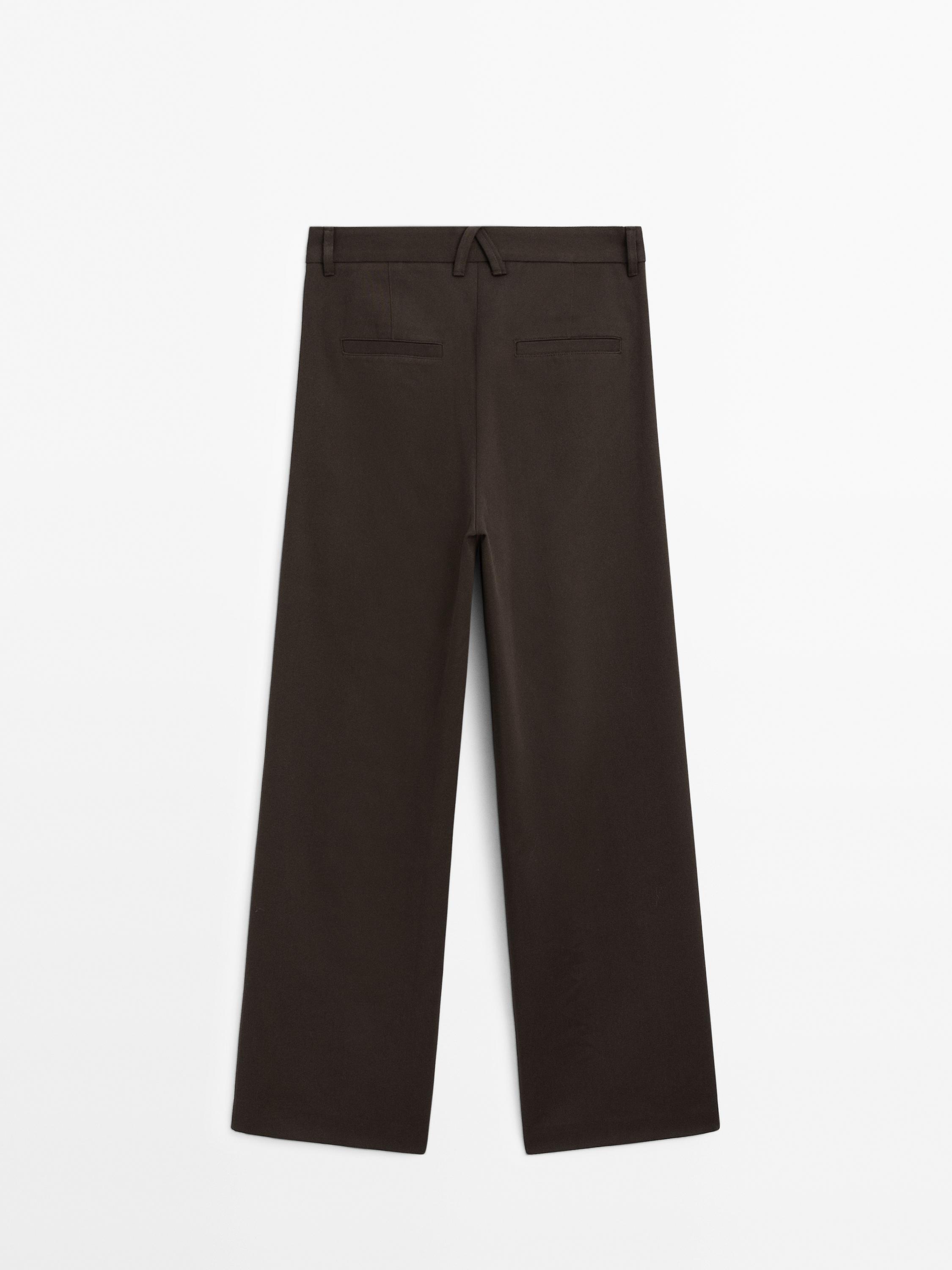 Wide-leg pleated cotton blend trousers