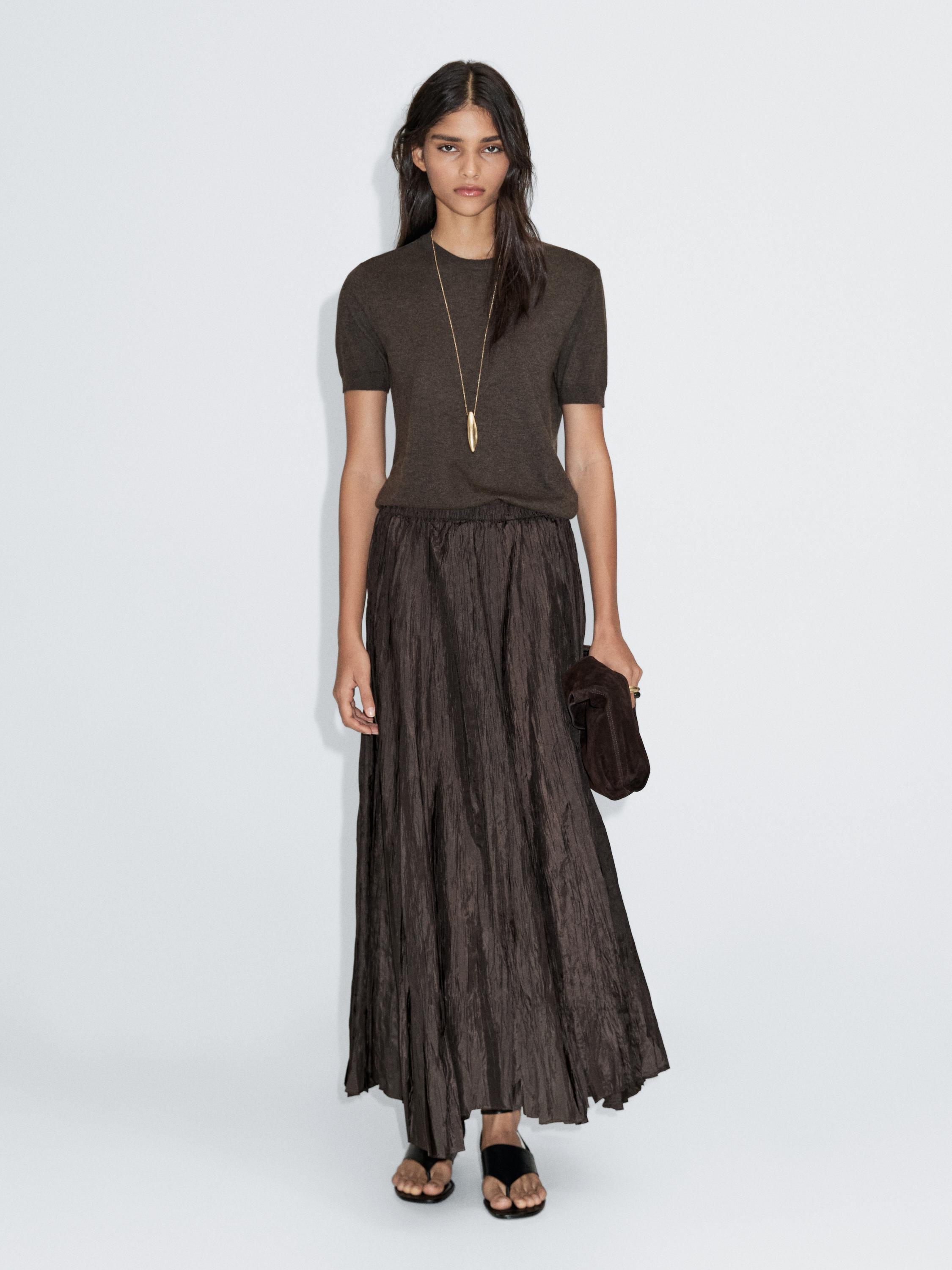Long pleated creased-effect skirt