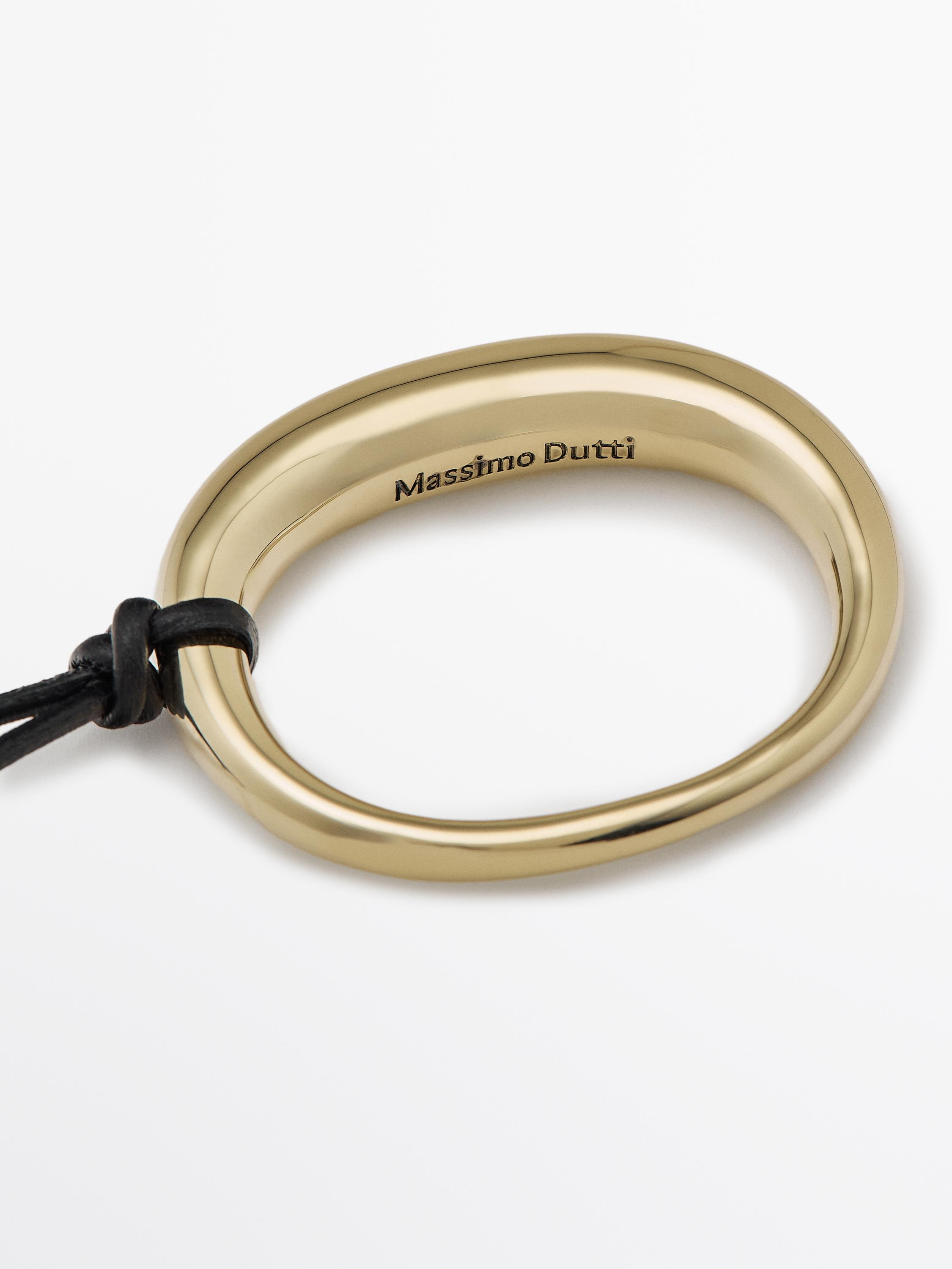 Leather cord necklace with oval piece
