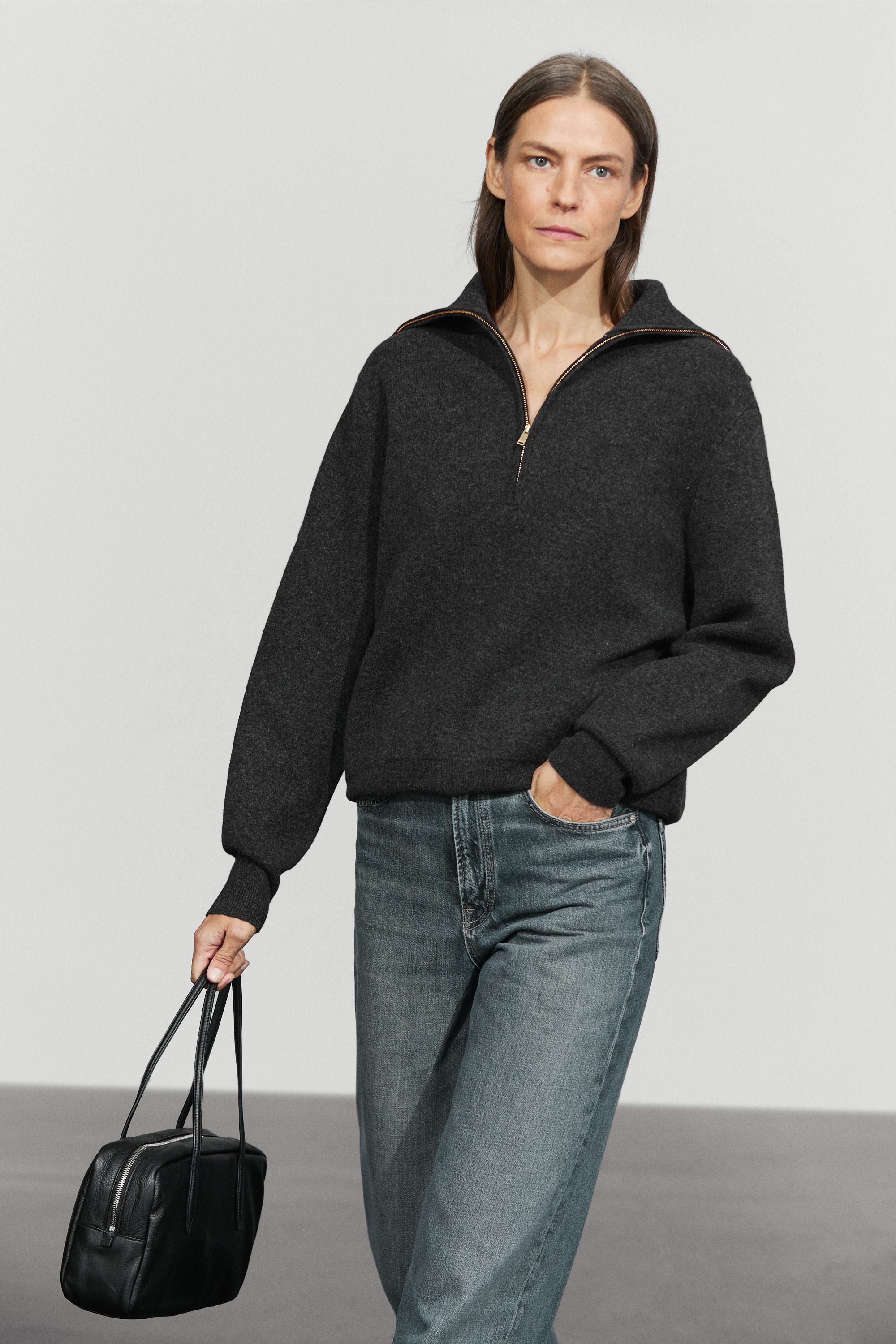Wide collar zip-up knit sweater