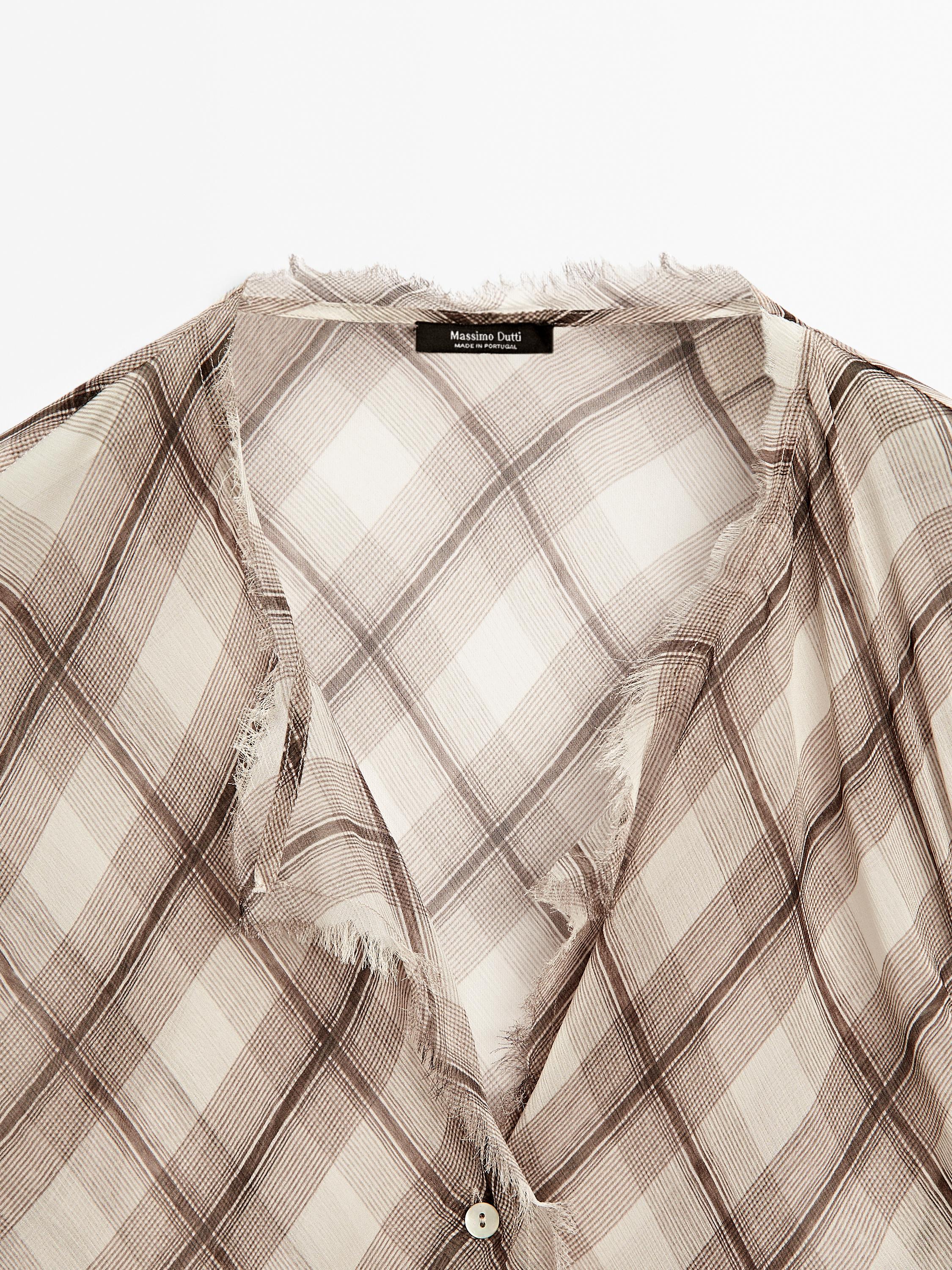 Check shirt with frayed trims