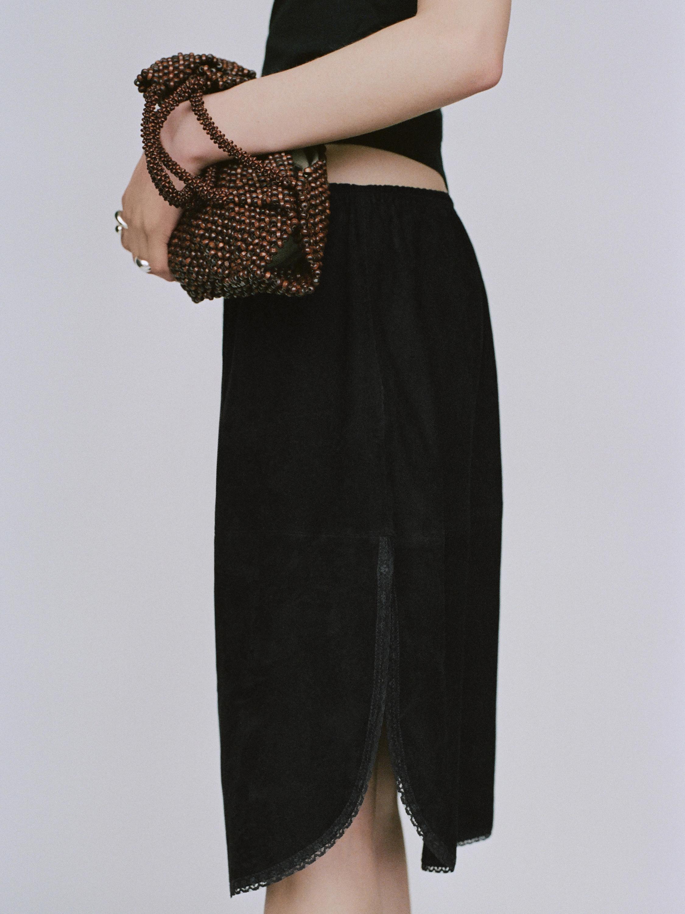 Suede leather skirt with lace detail