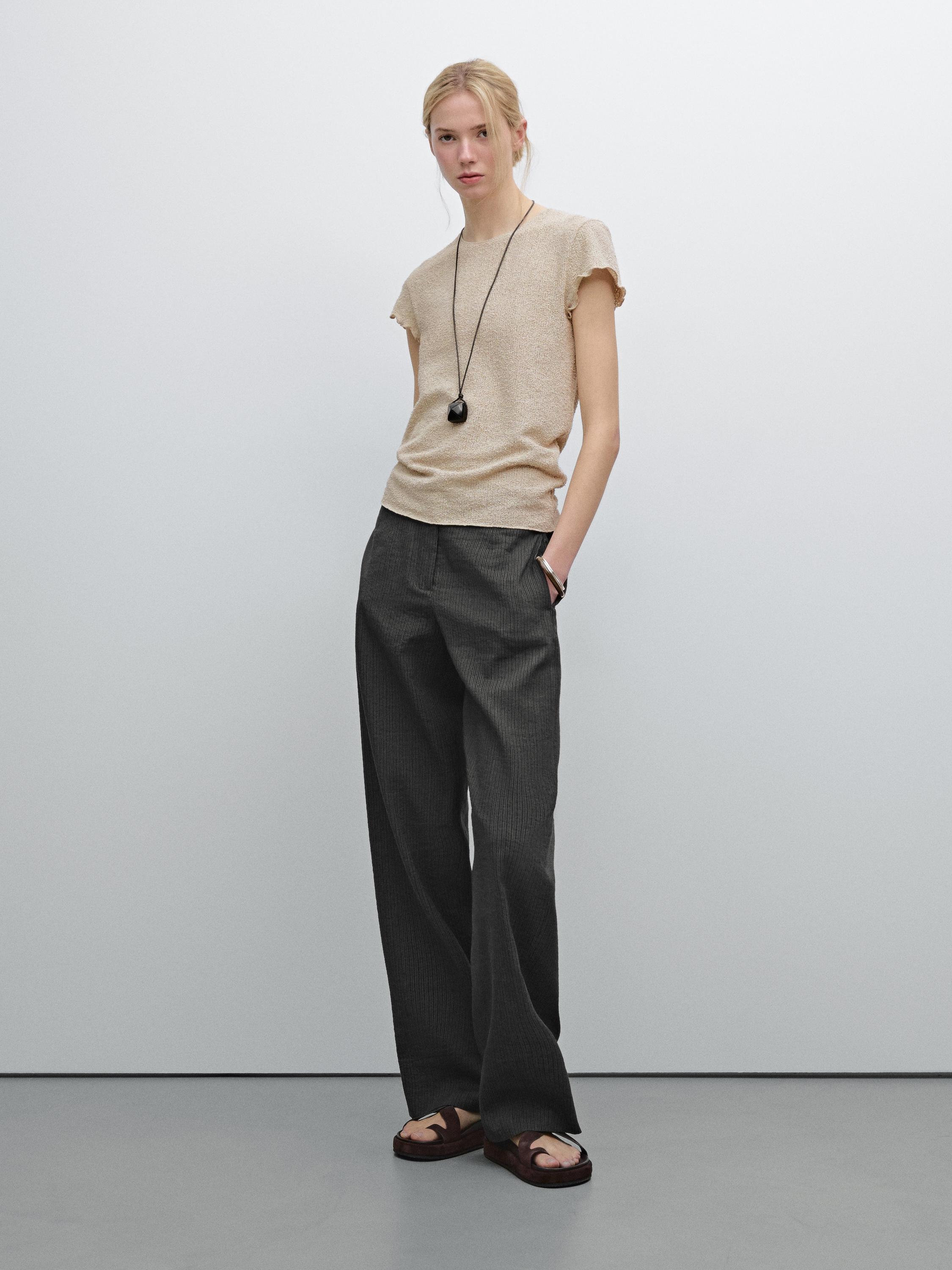 Camiseta punto detalle ribetes ondulados