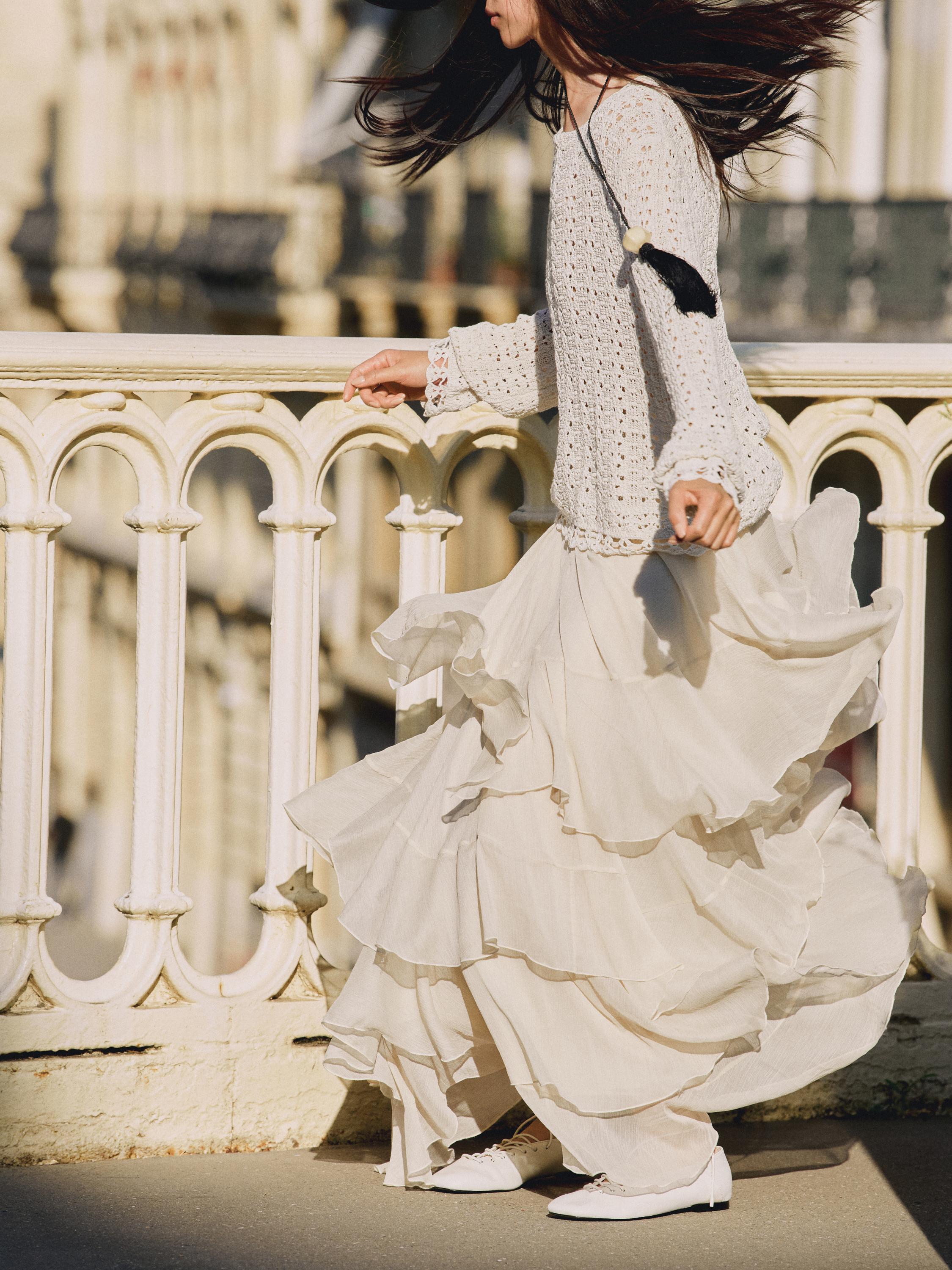 Long ruffled skirt with sash