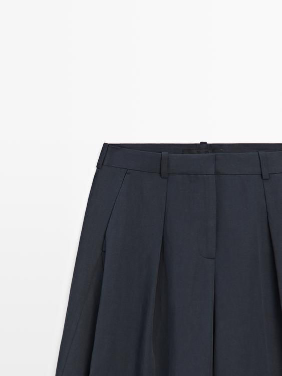 Pens detaylı dökümlü pantolon