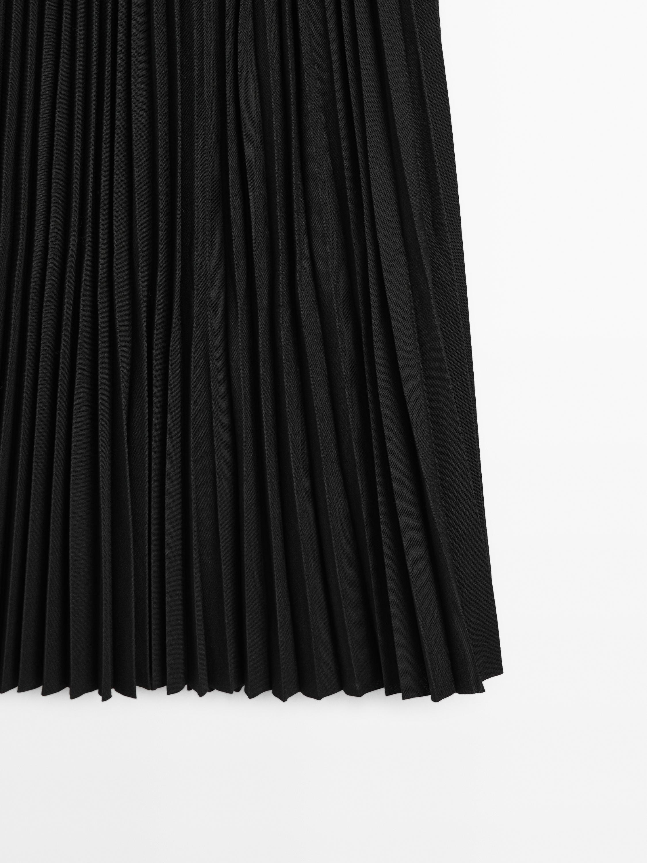 Flowing pleated midi skirt