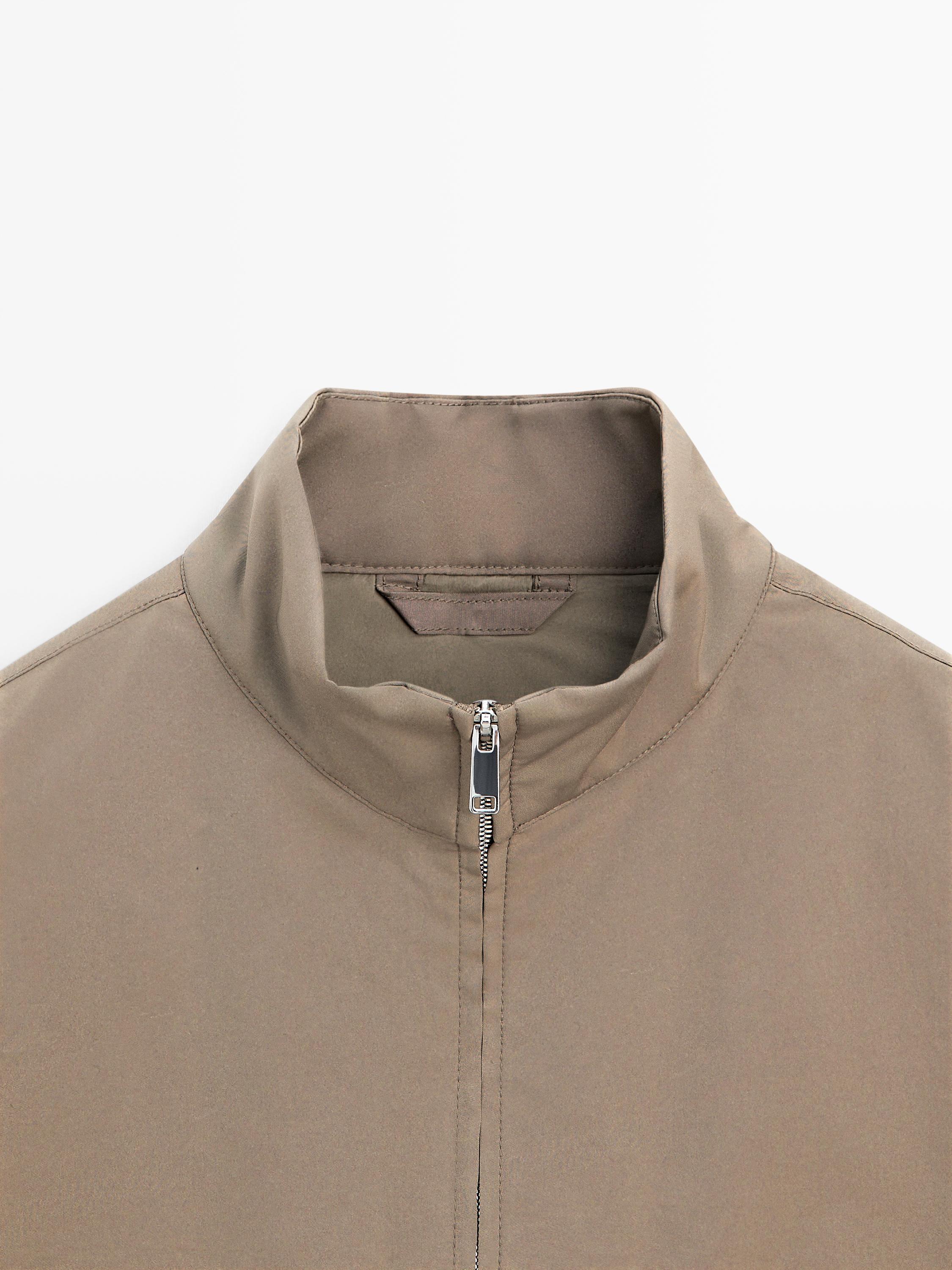 Water-repellent puffer jacket with high neck — PALE KHAKI