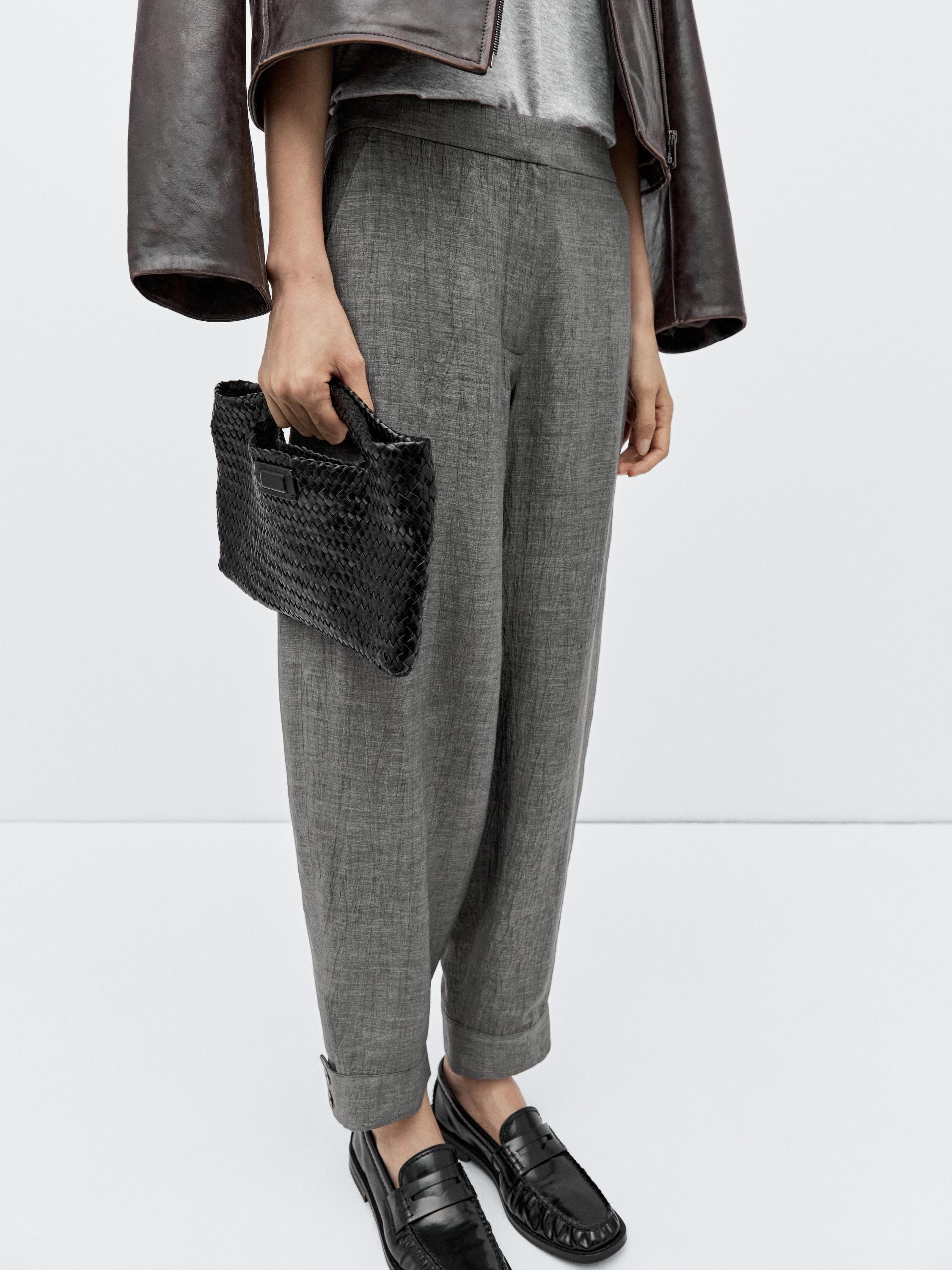 Pantalón bombacho detalle botones