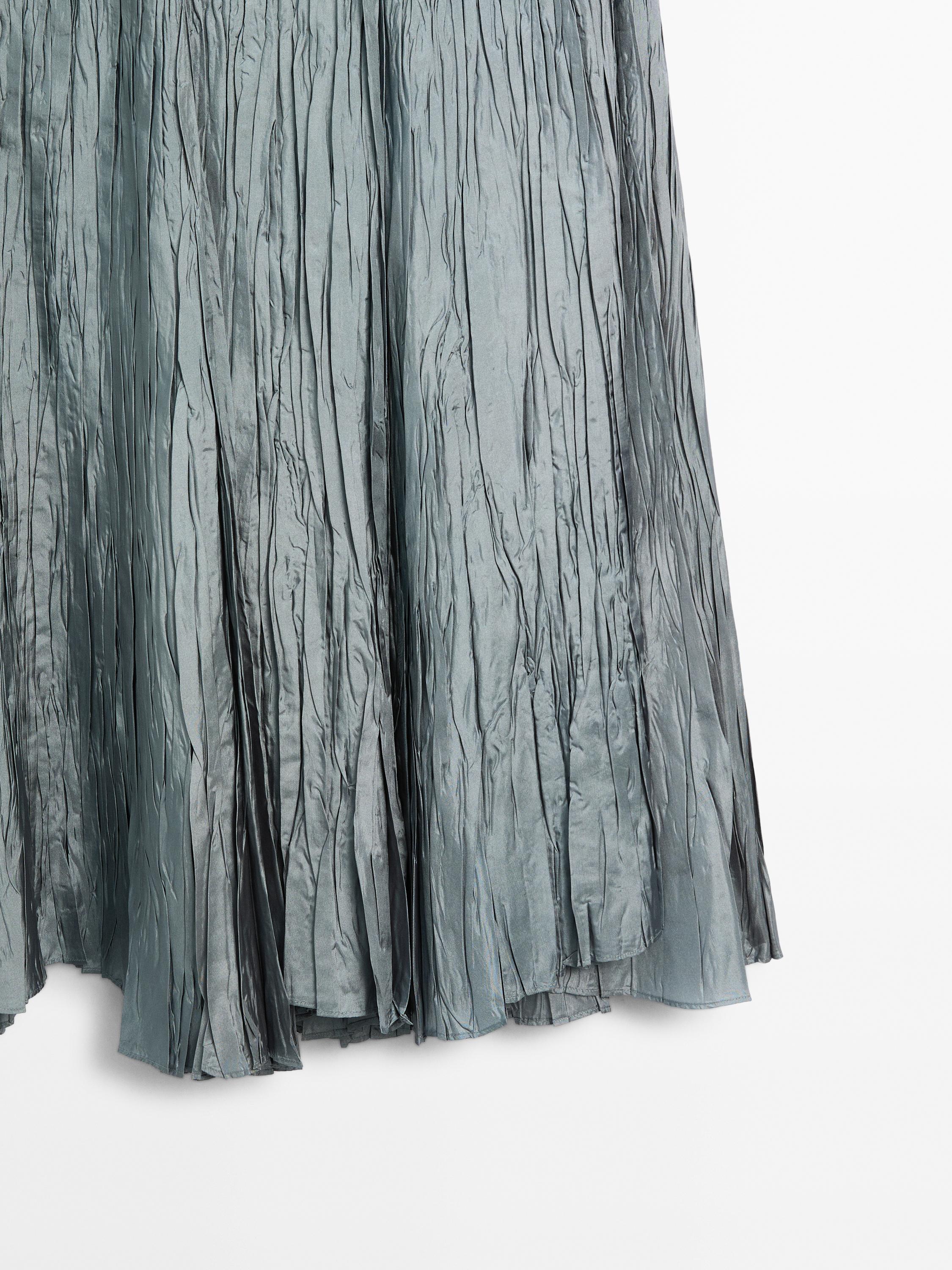 Long pleated skirt with elasticated waistband